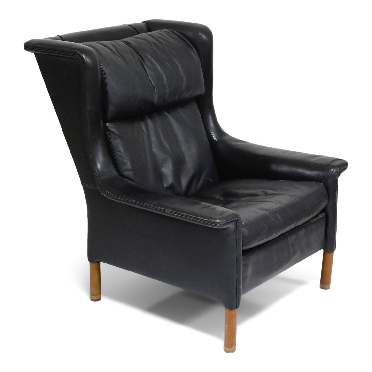 Danish Pair of Black Leather Wingback Chairs and Ottoman by Gerhard Berg, 1965