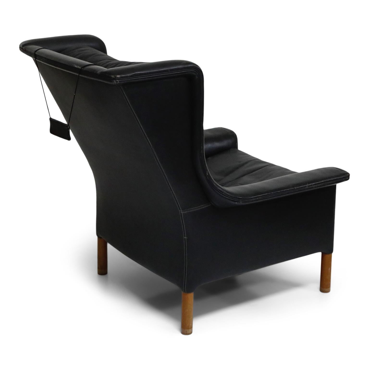 Mid-20th Century Pair of Black Leather Wingback Chairs and Ottoman by Gerhard Berg, 1965