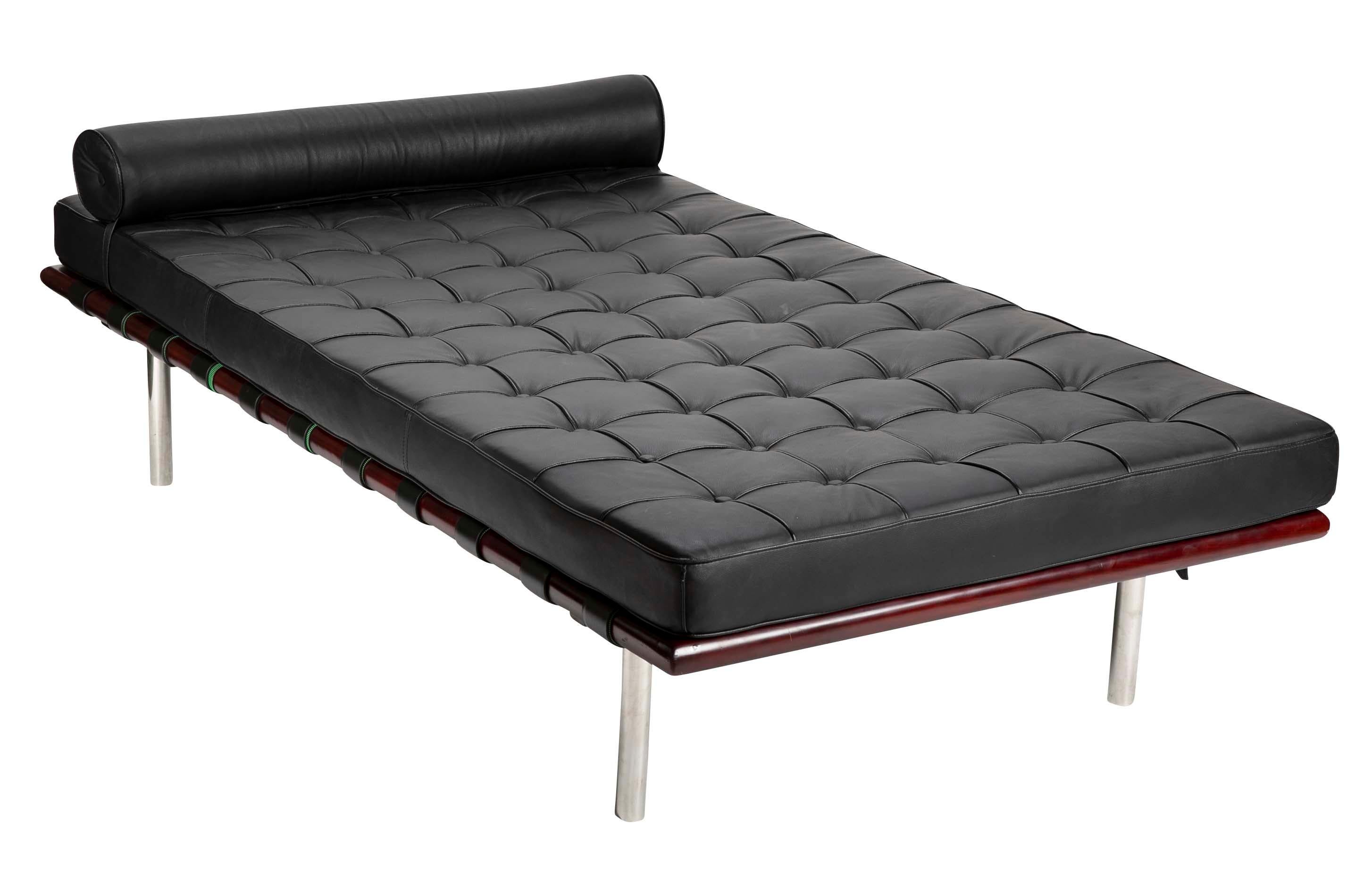 Black leatherette chaise lounge in the manner of Mies van der Rohe.  