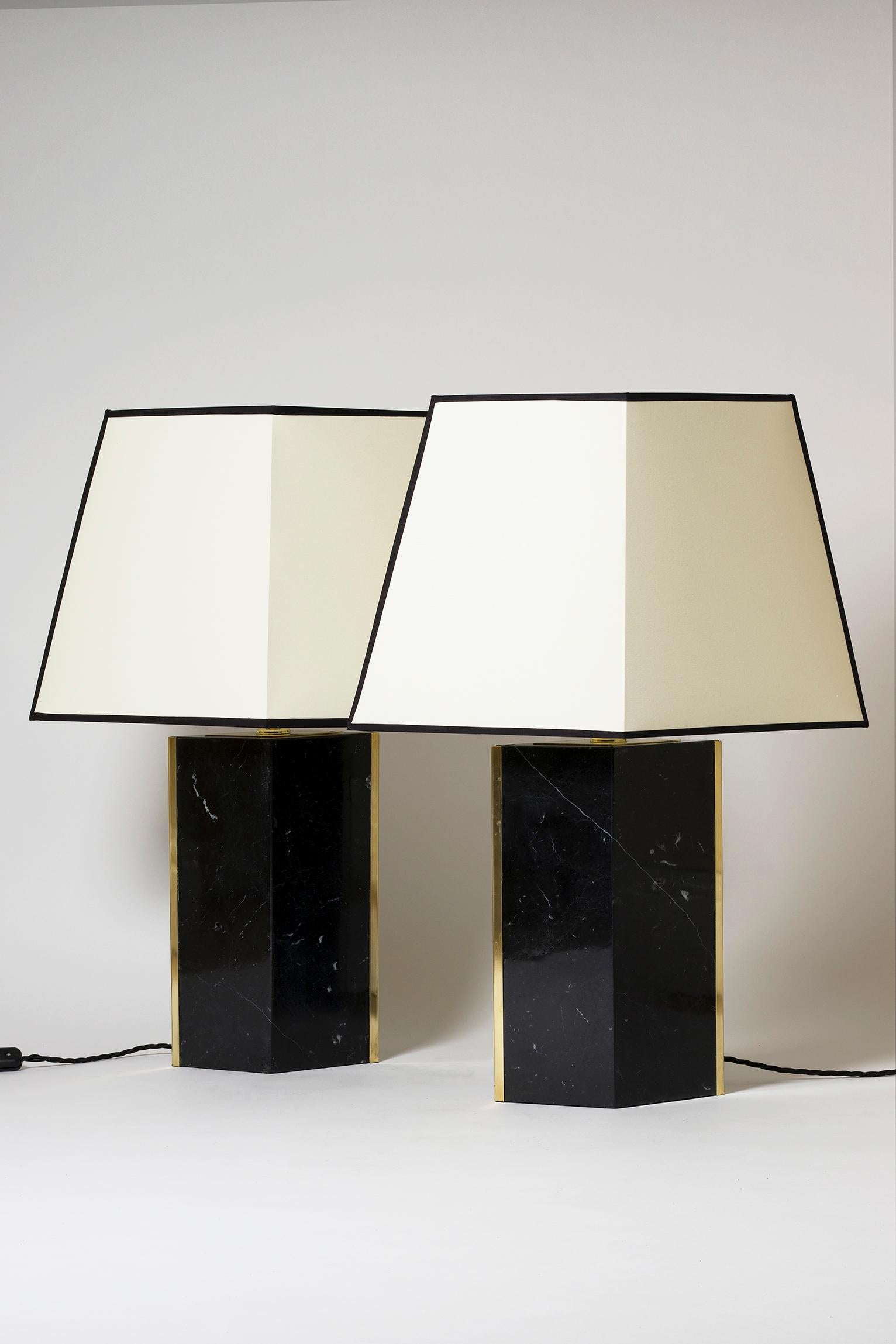 The 'Marine' table lamp, by Dorian Caffot de Fawes.
Limited Edition of 6 singles lamps. 
Solid Nero Marquina black marble carried in Italy, with brass mounts and bespoke diamond shaped shades (handmade in the UK)
With the shade: 67 cm high by 49