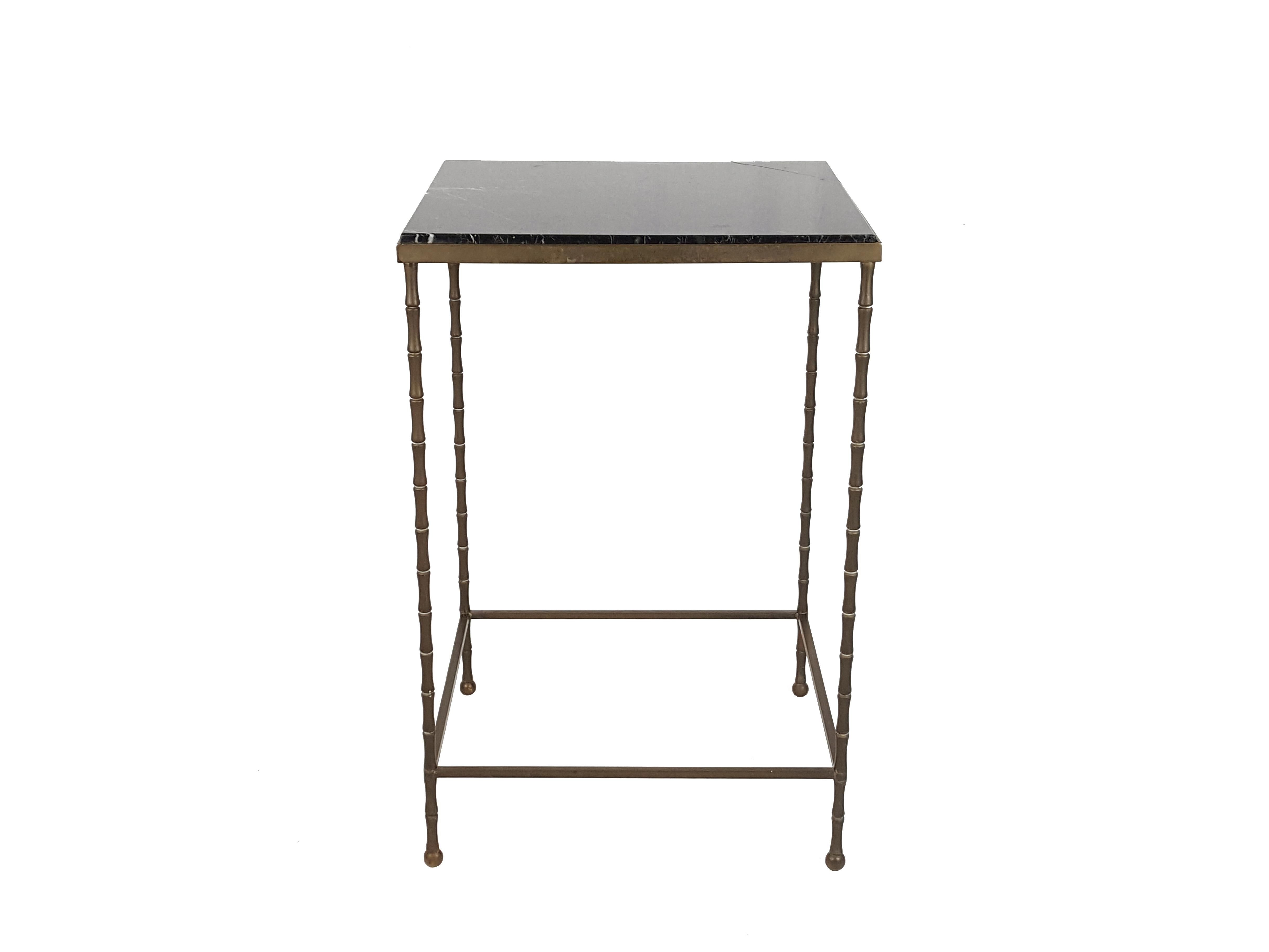 This pair of side table/nightstand is made from brass structure with black and white marble tabletop. they remain in good condition: oxidation patina of the brass; one top shows a breakage close to a corner as showed in picture. The defect is