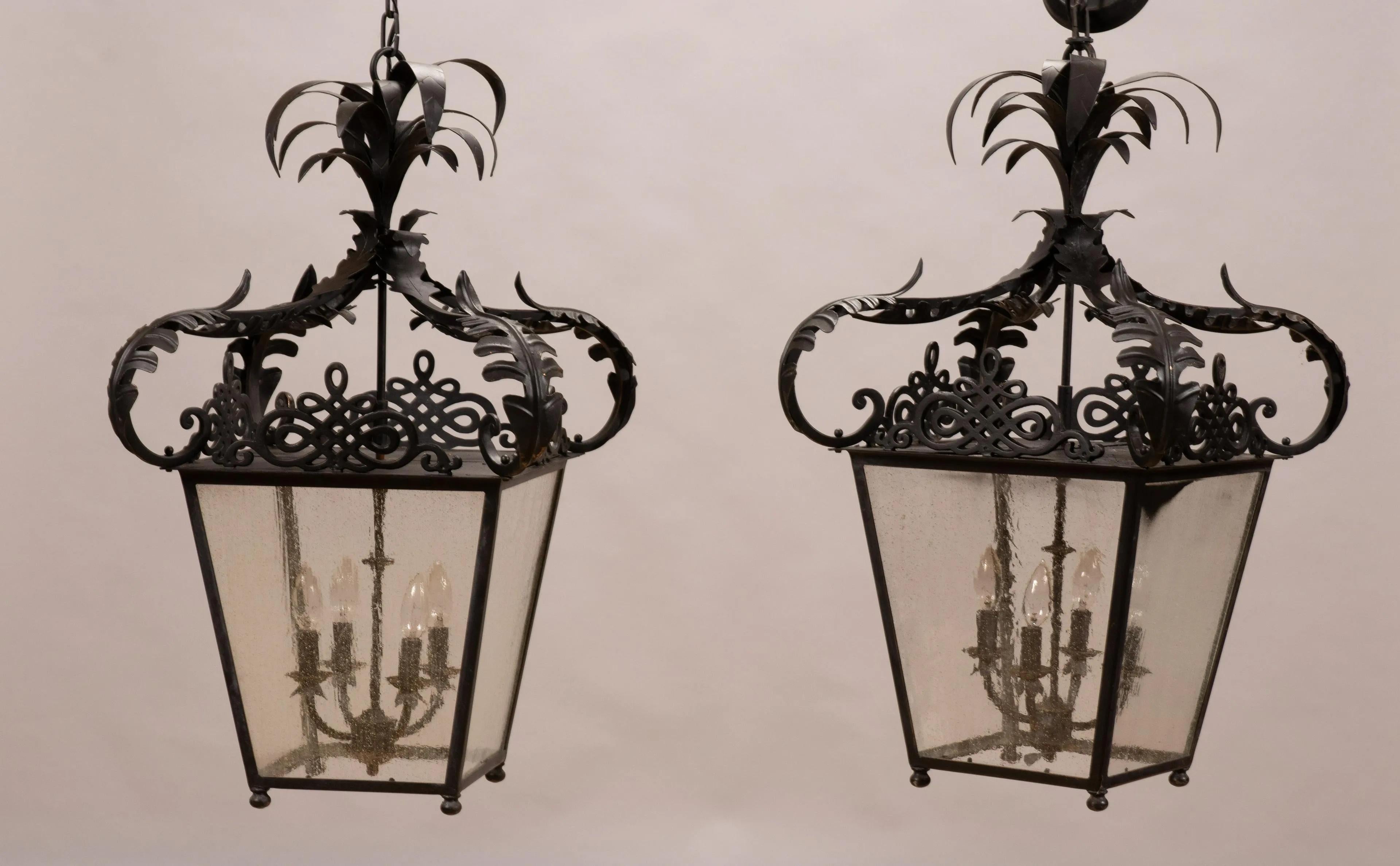 Black metal lantern chandeliers, pair, measures: Height 32