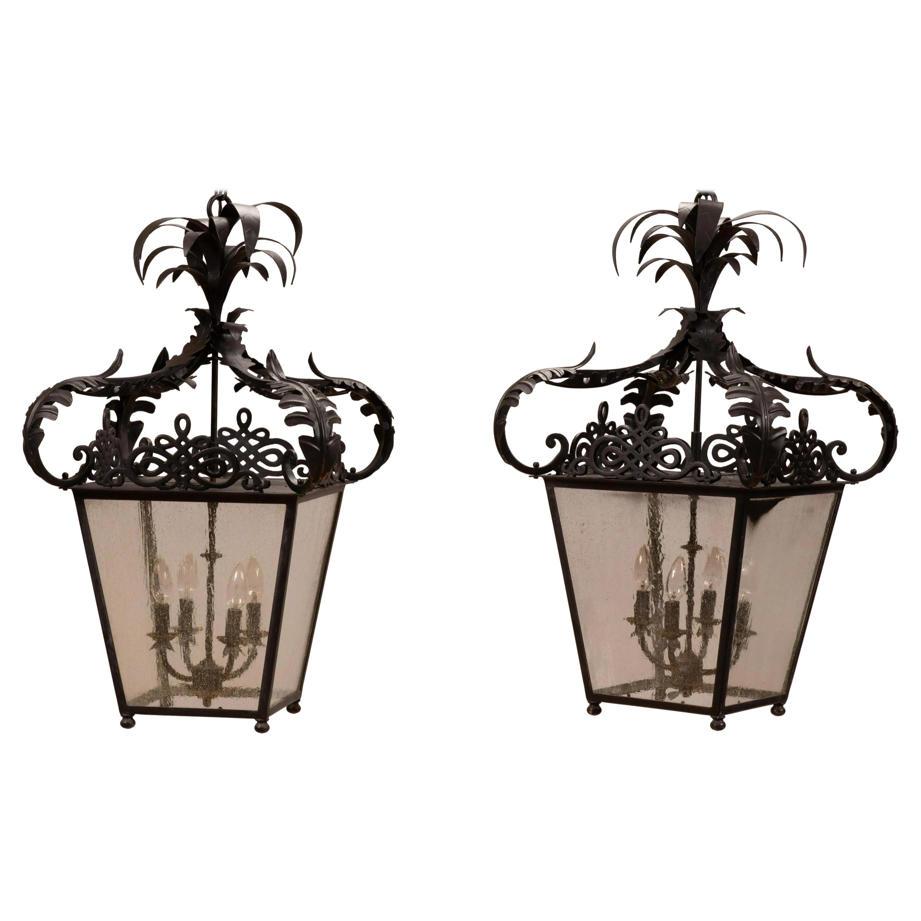 Pair of Black Metal Neoclassical Lanterns with Palm Frond Tops