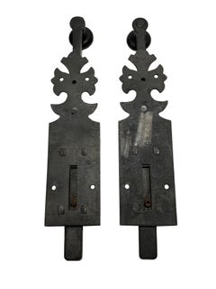 Pair of vintage Spanish–style metal sliding bolt gate latches