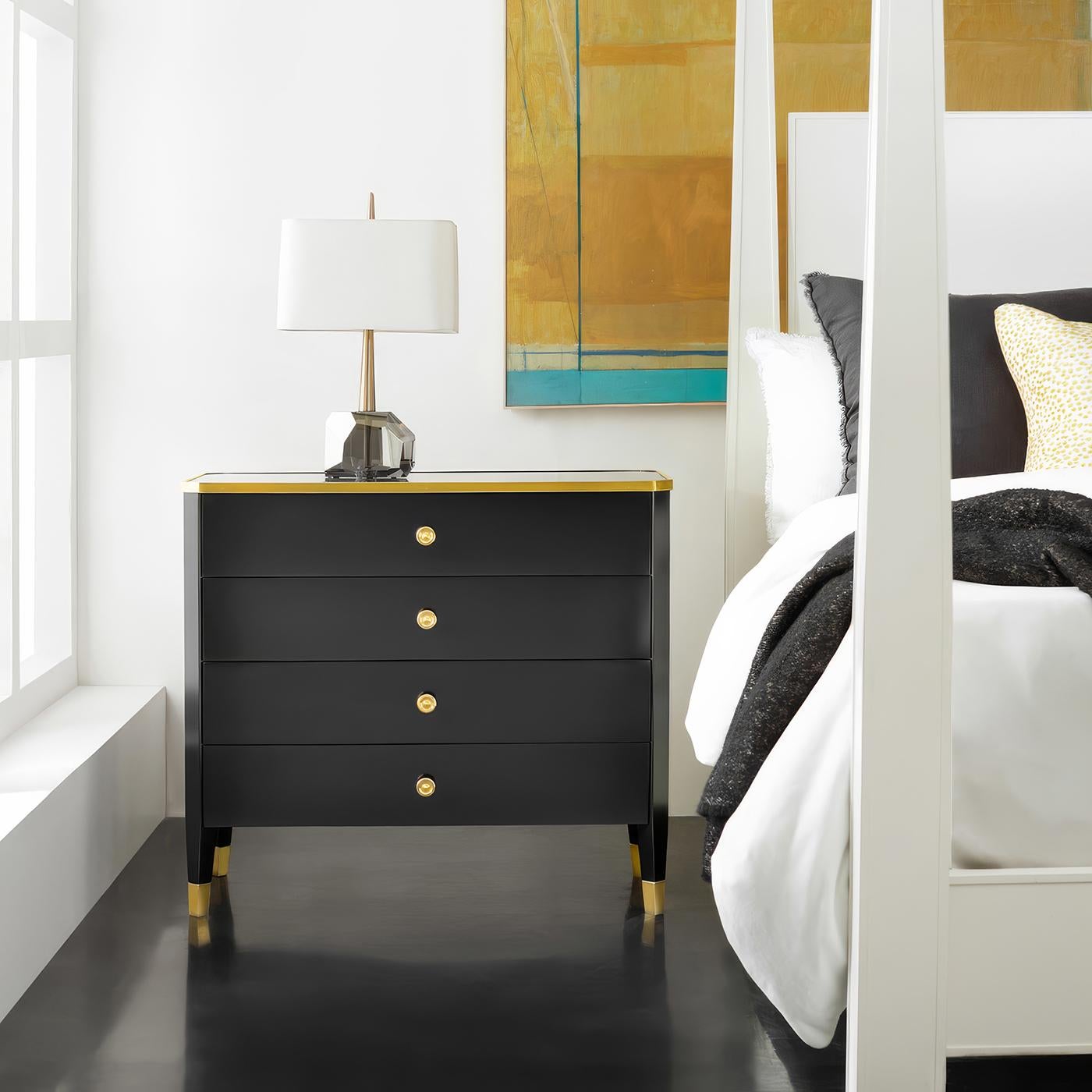 This sophisticated piece combines timeless style with practical features. Its sleek black lacquer finish is complemented by a luxurious marble top and adorned with brass accents and hardware, creating a striking contrast that exudes