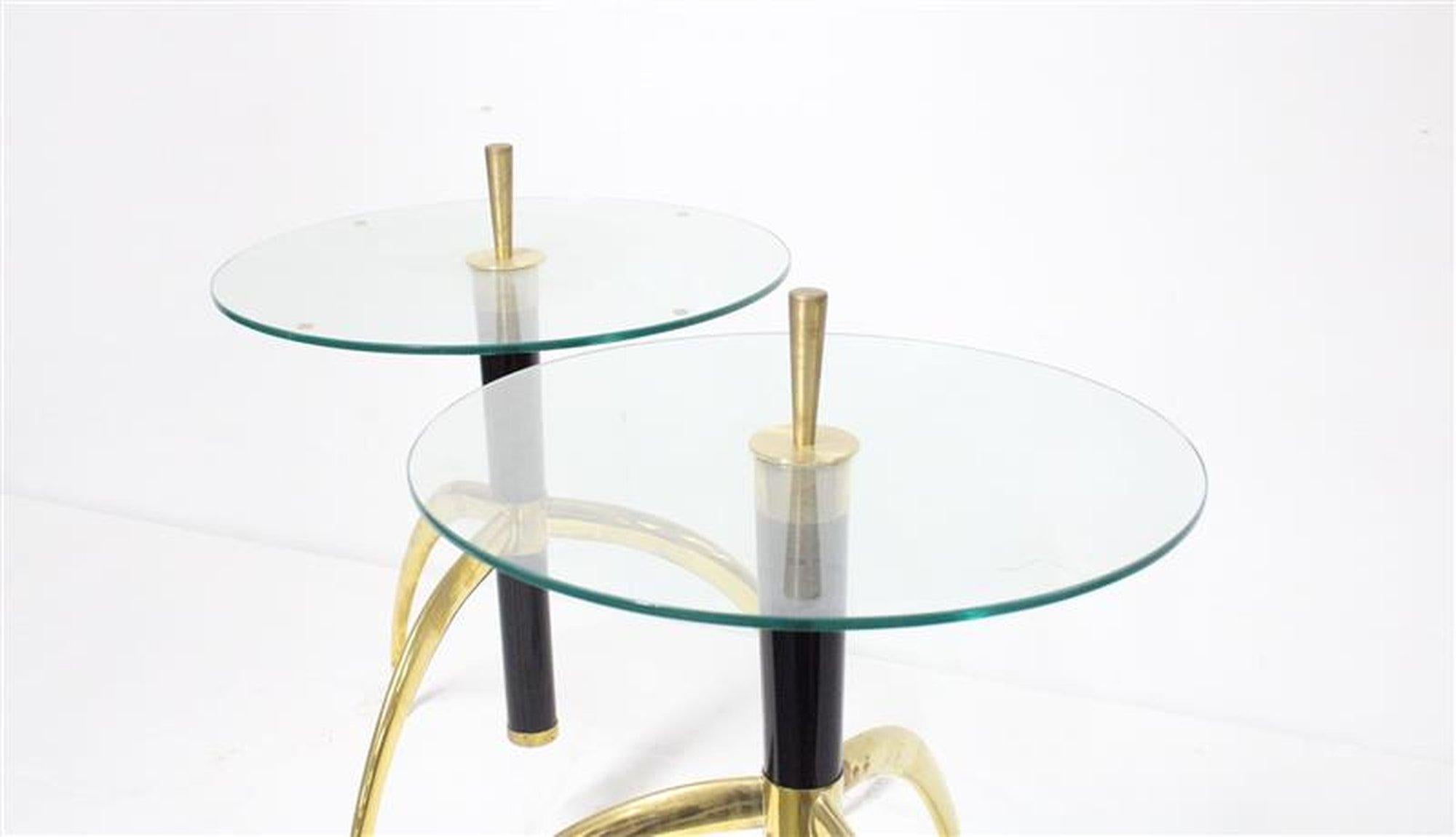 Italian side or end tables, circular glass with a large brass finial connecting thick vintage hand blown black Murano glass tubular columns supported by contemporary curved brass tripod bases.
 Italian Craftsmanship at is best.

Height goes to top