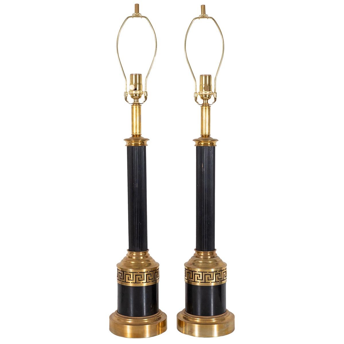 Pair of mixed metal neoclassical table lamps with pierced Greek key motif.