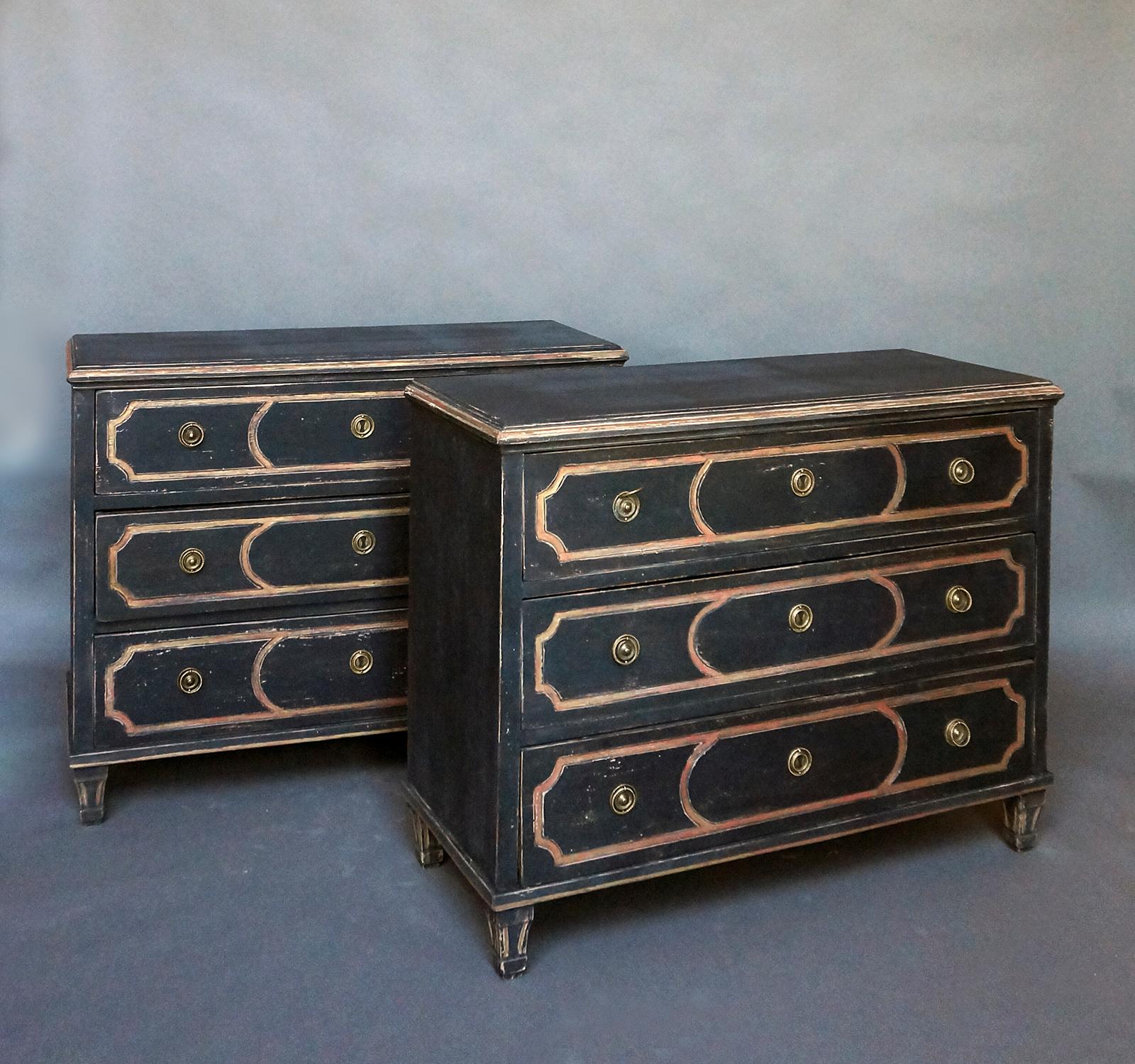 Pair of neoclassical three drawer chests, Sweden circa 1860, with shaped tops, incised detail, and brass hardware. The tapering square feet have matching decoration.