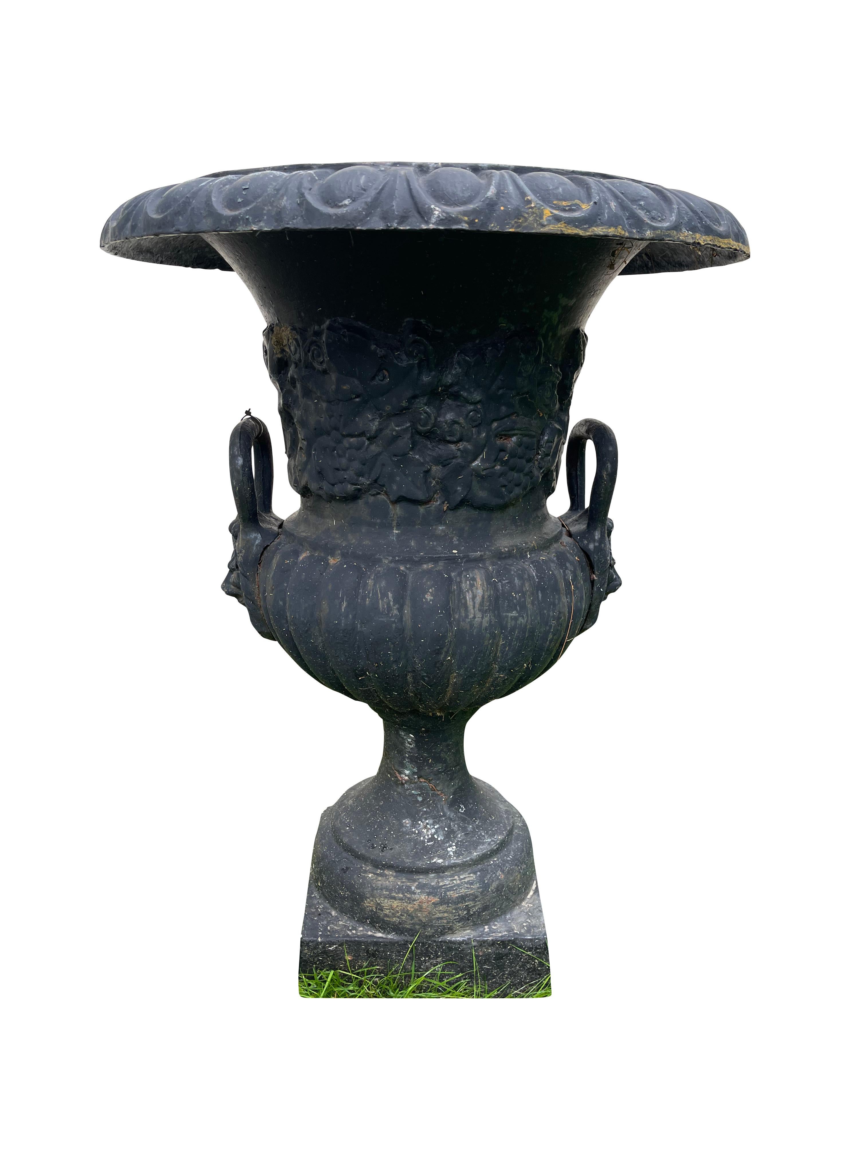Pair of Black Neoclassical Garden Urns with Lion Mask Decoration In Good Condition For Sale In Essex, MA