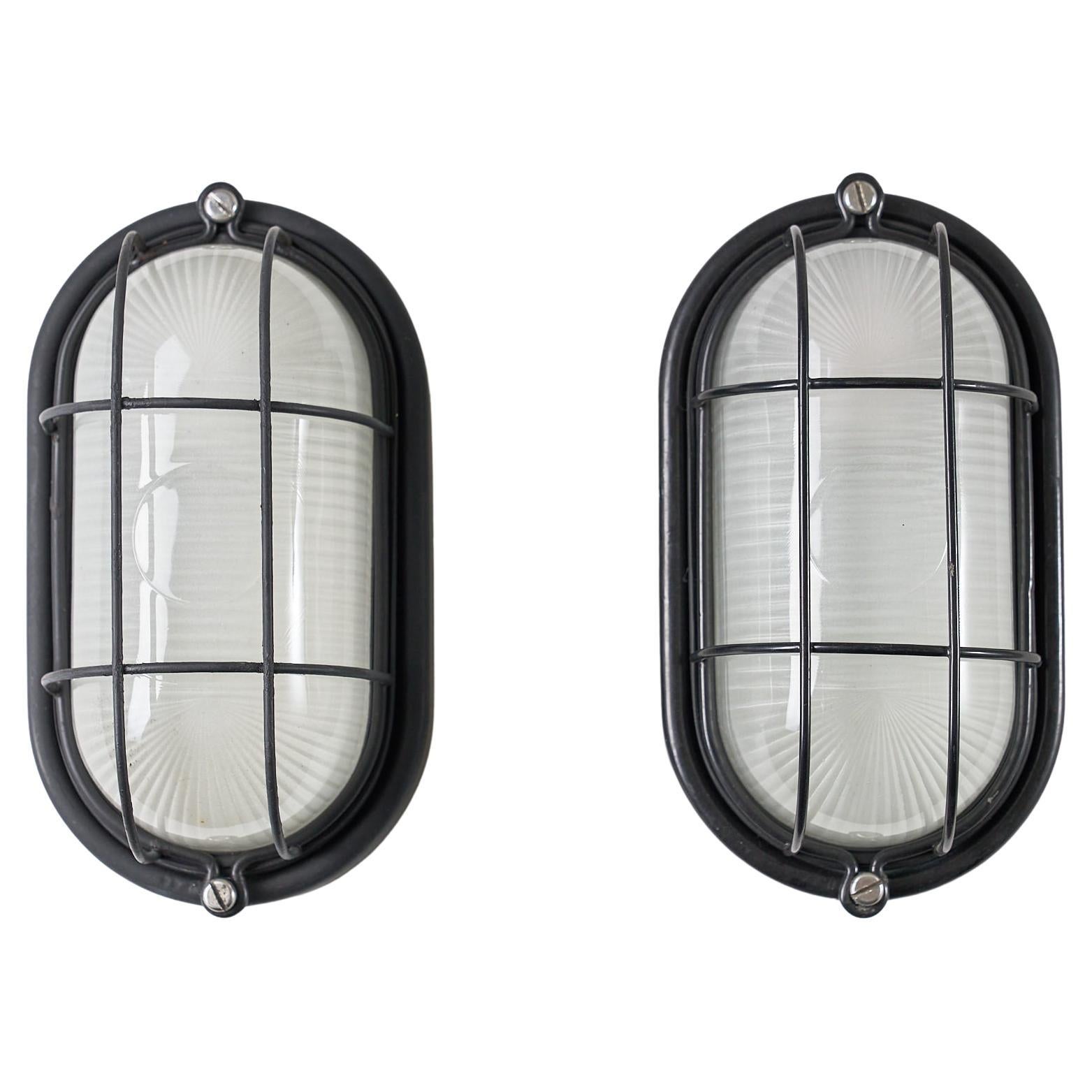 Pair of Black Oval Cage Wall Lamps (set)