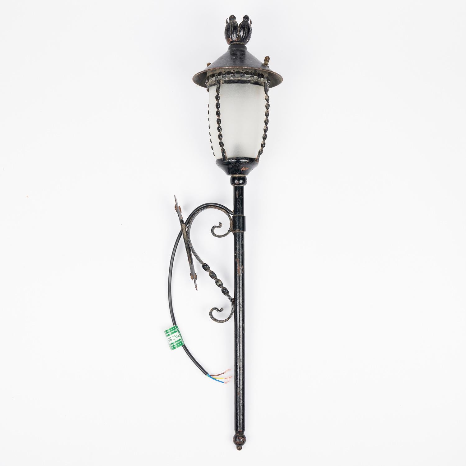 A pair of early 20th century black painted wrought iron wall lights, with frosted glass shades, circa 1920.

A pair of early 20th century black painted wrought iron wall lights, with frosted glass shades, circa 1920.

Rewired and tested.

 

 