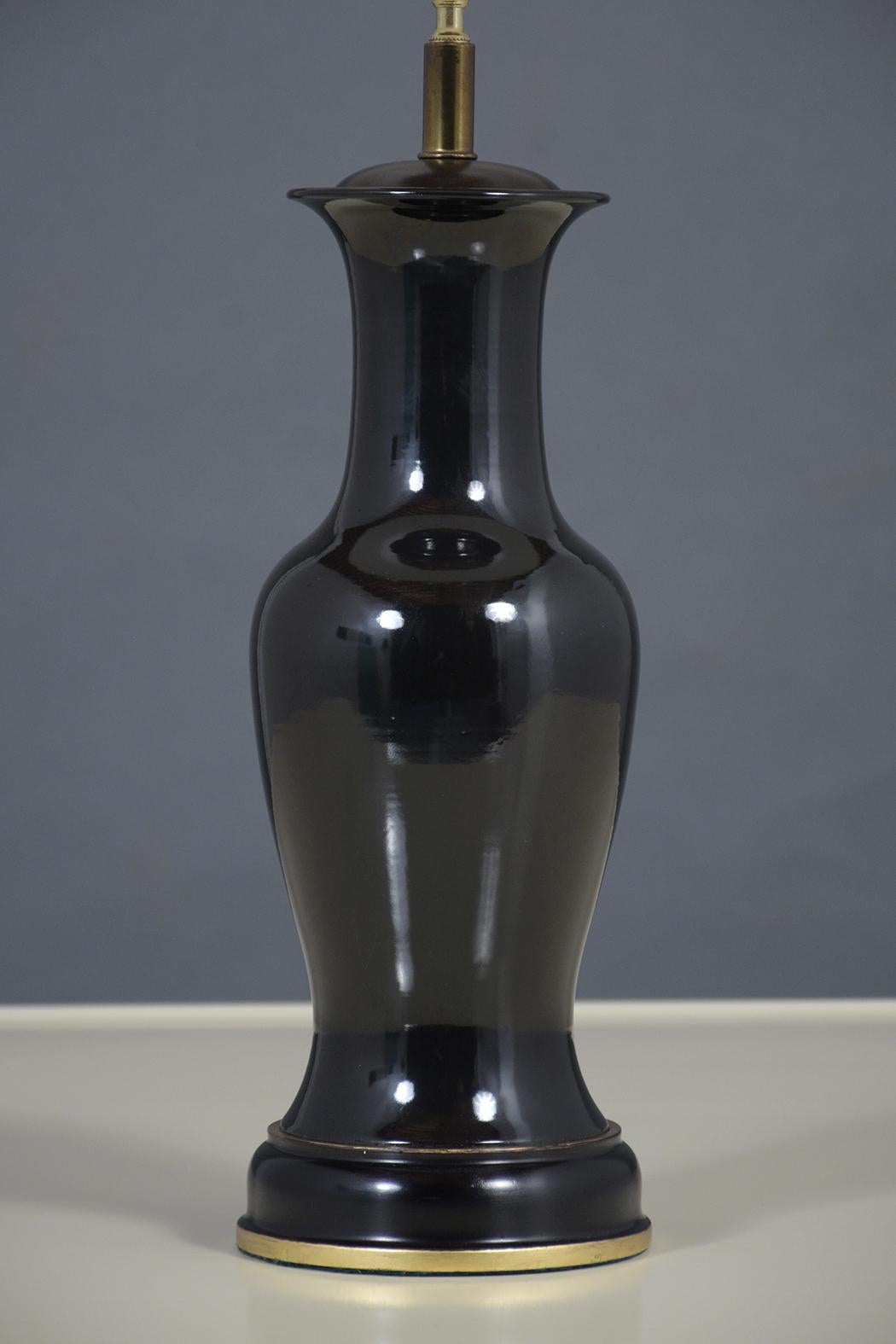 Early 20th Century Pair of Black Porcelain Table Lamps