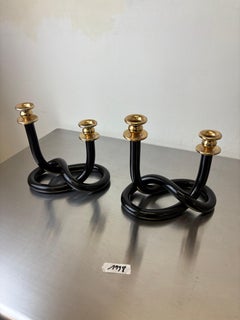 Pair of Black pretzel candlesticks by Dorothy Thorpe, Circa 1970's
