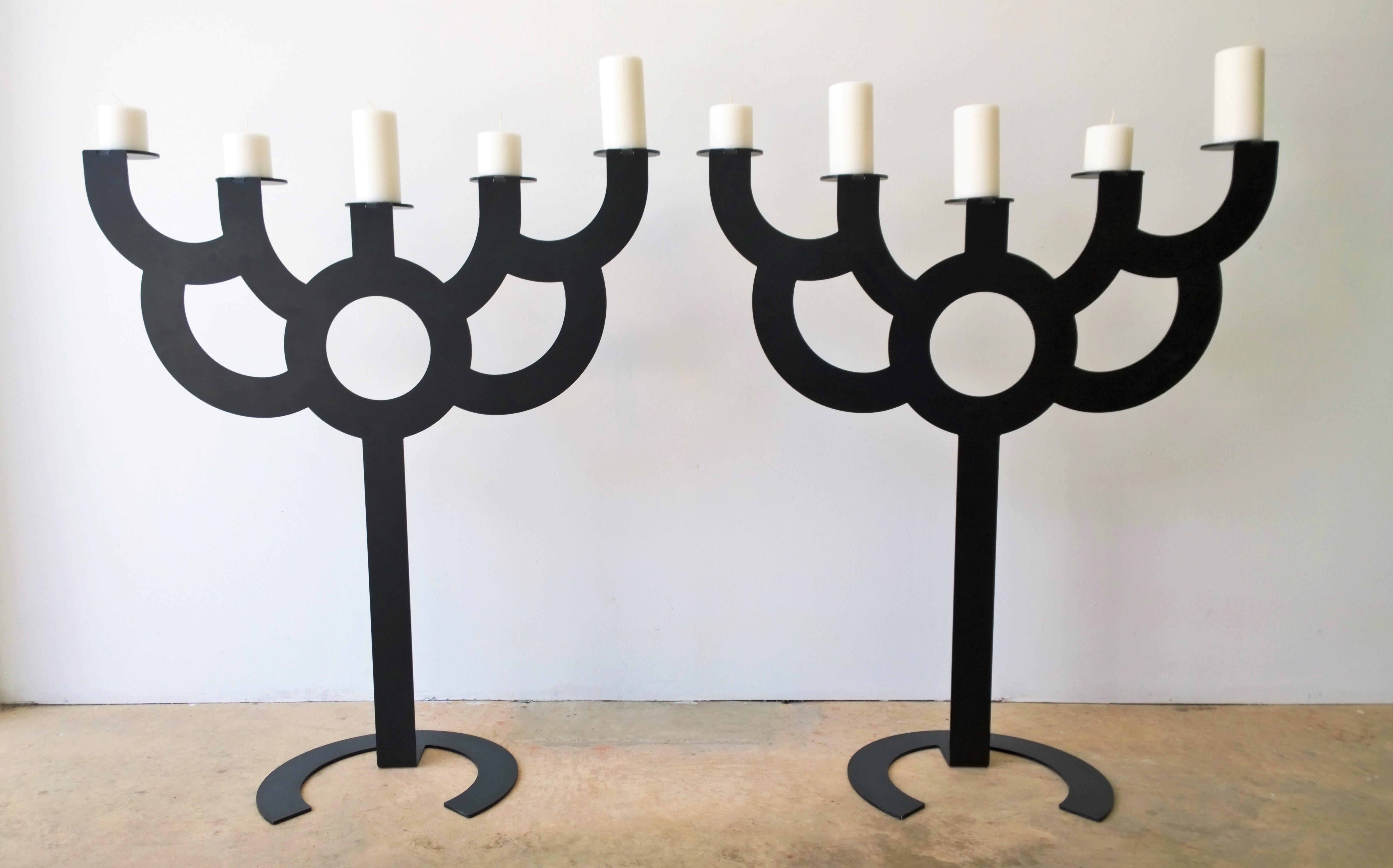 Offered are a pair of Postmodern Roderick VOS for Moooi big bold black metal candelabras with five candelabra arms each. Oversized pair of candelabras, 