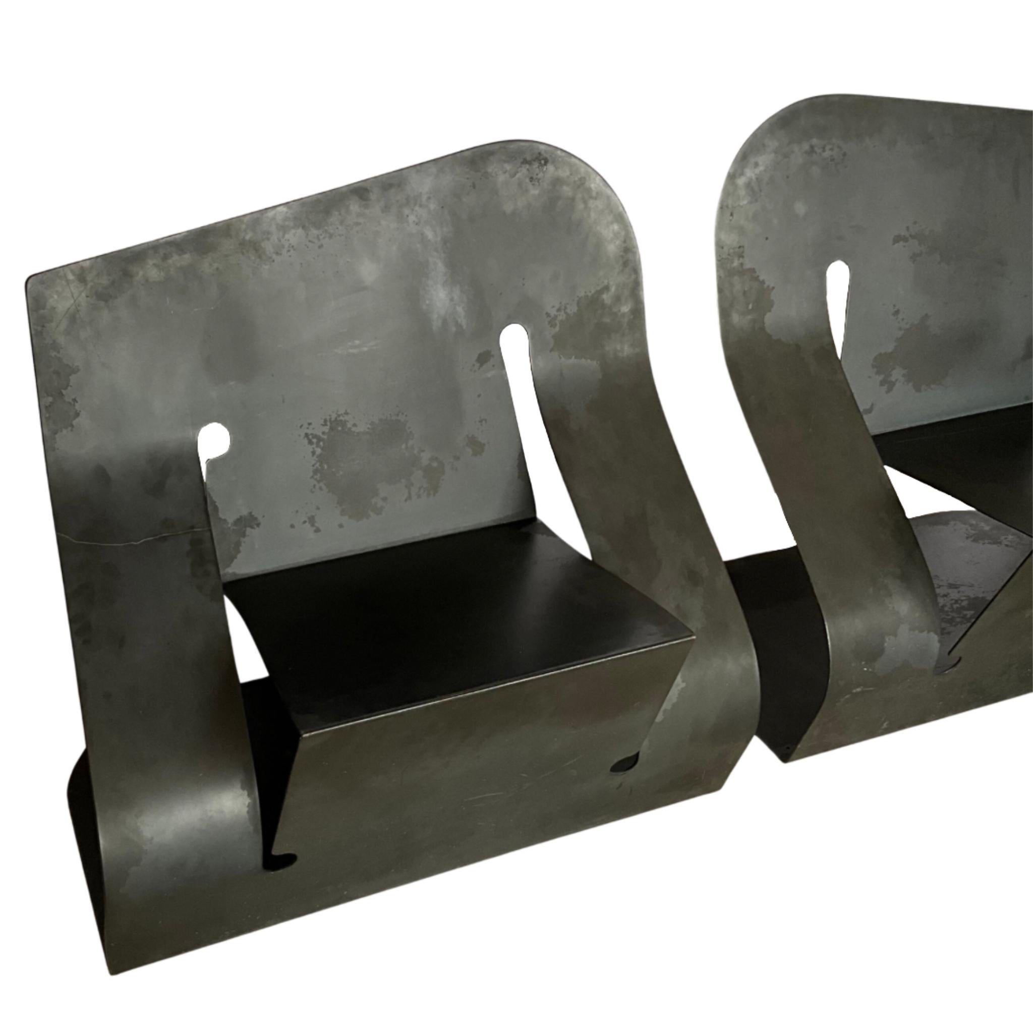American Pair of Black Steel “Rocker” Chairs by Rico Eastman