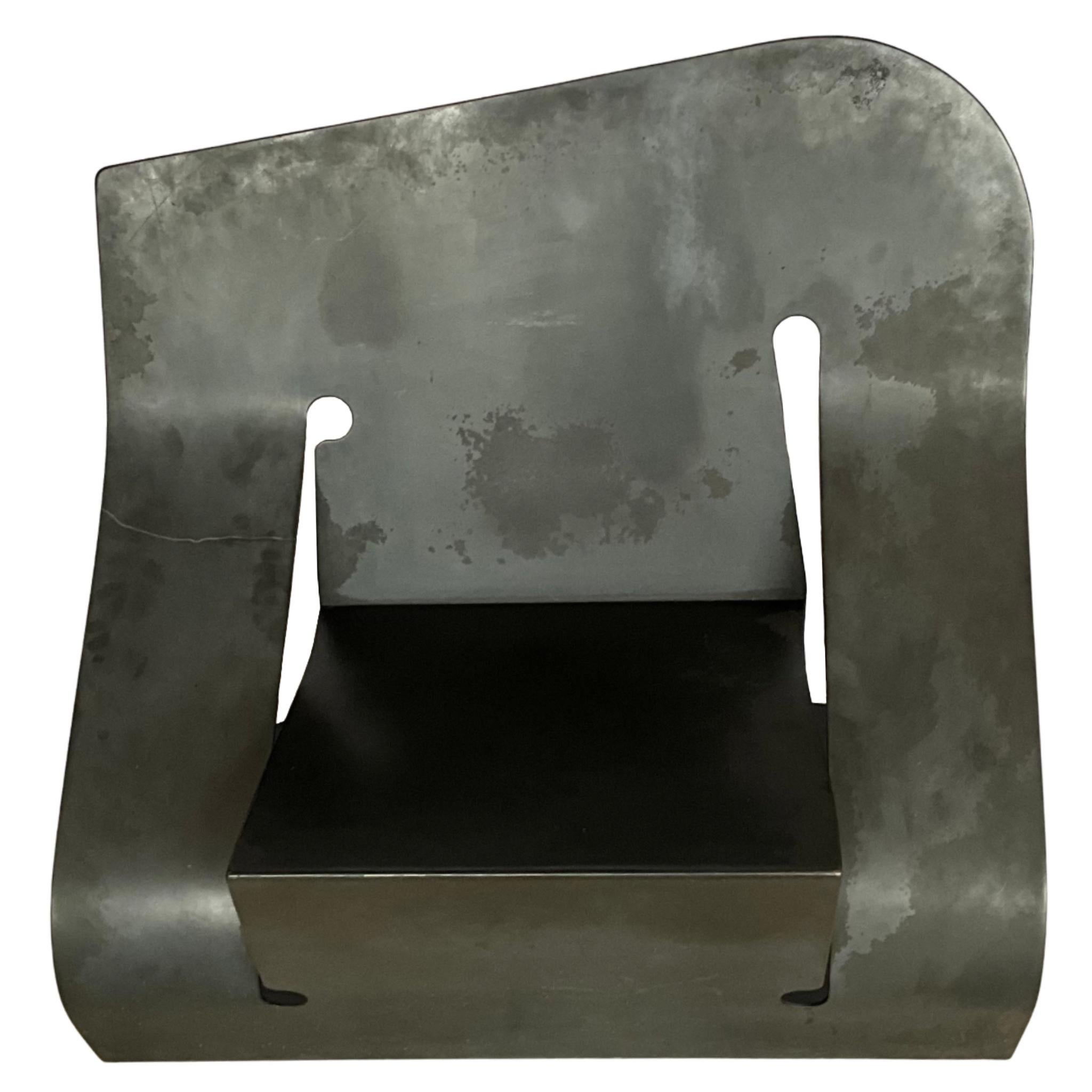 Metal Pair of Black Steel “Rocker” Chairs by Rico Eastman