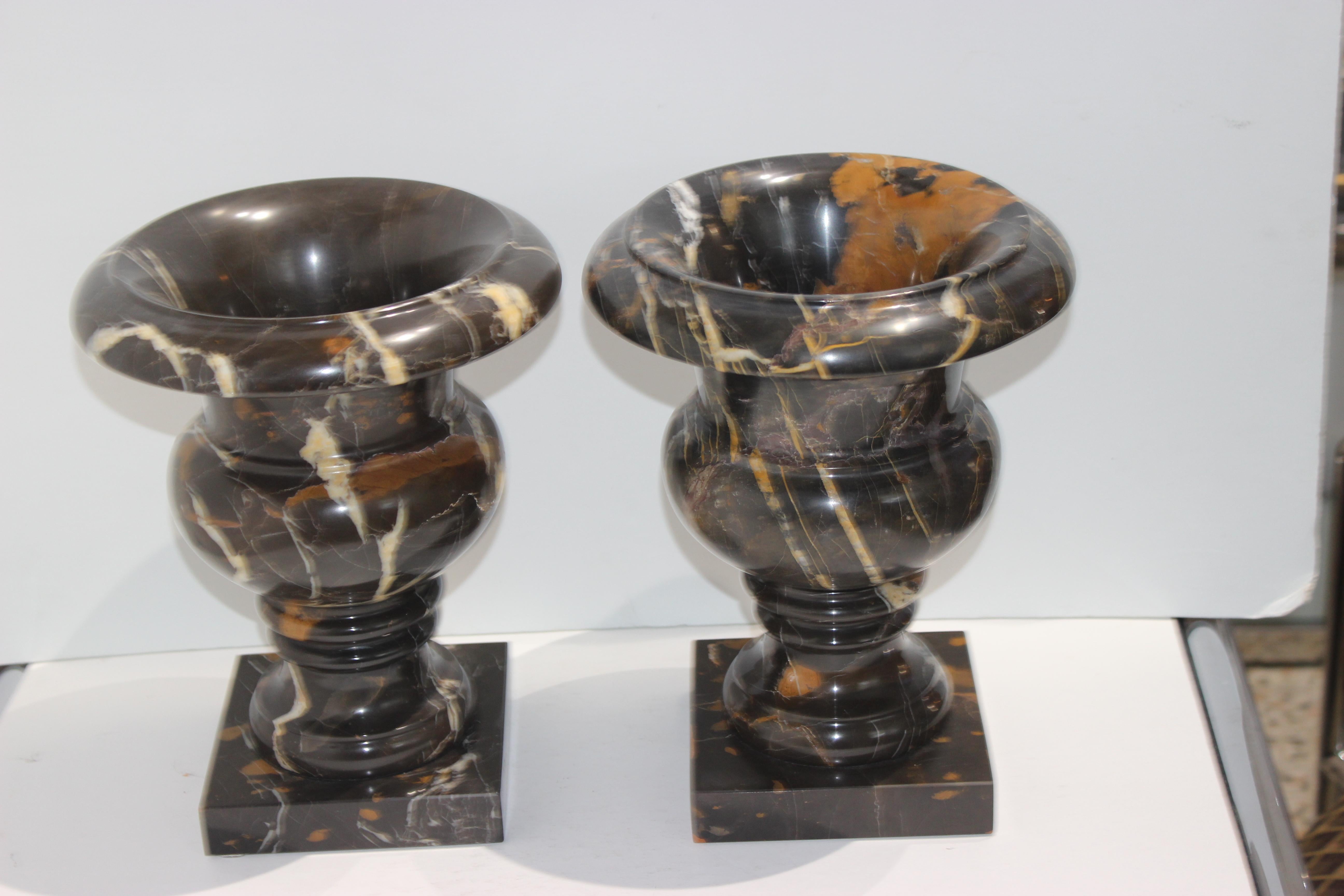 This stylish set of marble urns date to the 1930s and were acquired from a Palm Beach estate.

                