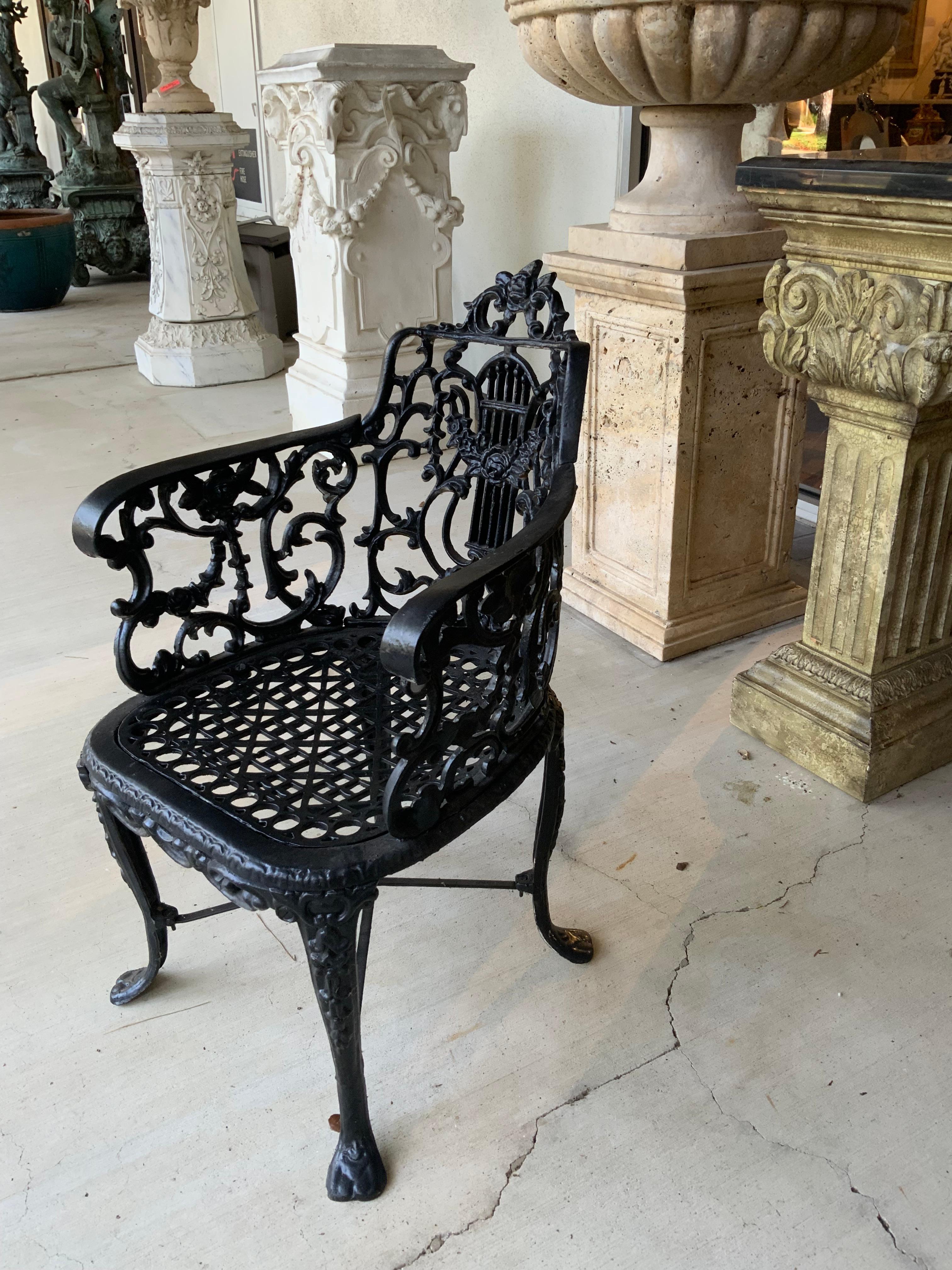 20th Century Pair of black Victorian cast iron garden chairs For Sale
