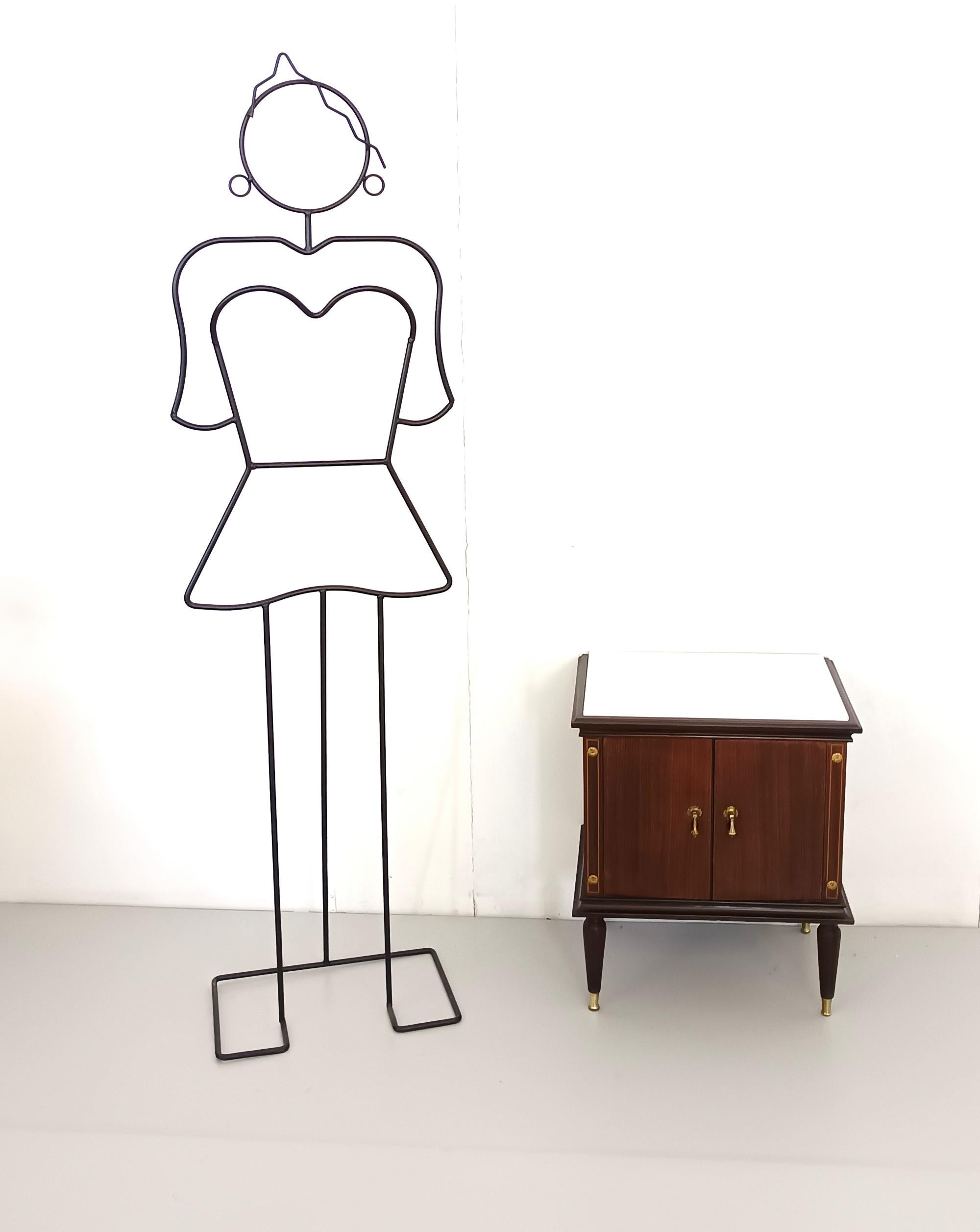 Made in Italy, 1950s.
They are made in black walnut and feature brass handle, feet caps and details. 
These nightstands also have a Portuguese pink marble top with a white shade. 
These nightstands may show slight traces of use since they're