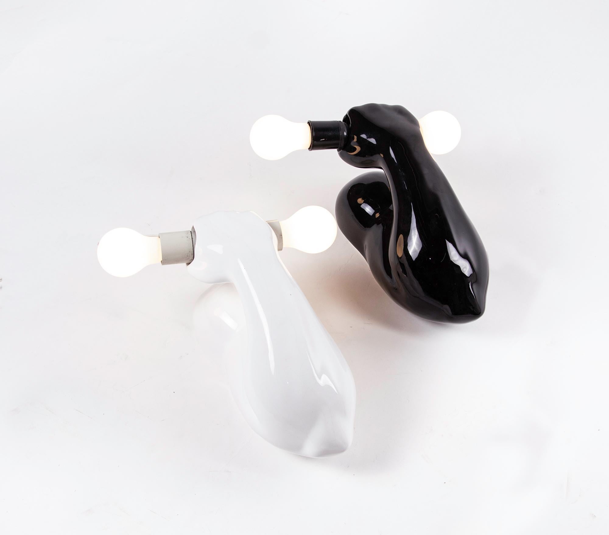 Mid-Century Modern 1980 French J.C. Peiré Pair of Black & White Ceramic Biceps Wall Lights For Sale