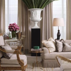 Pair of Black Wood Veneered Columns, 21st Century.