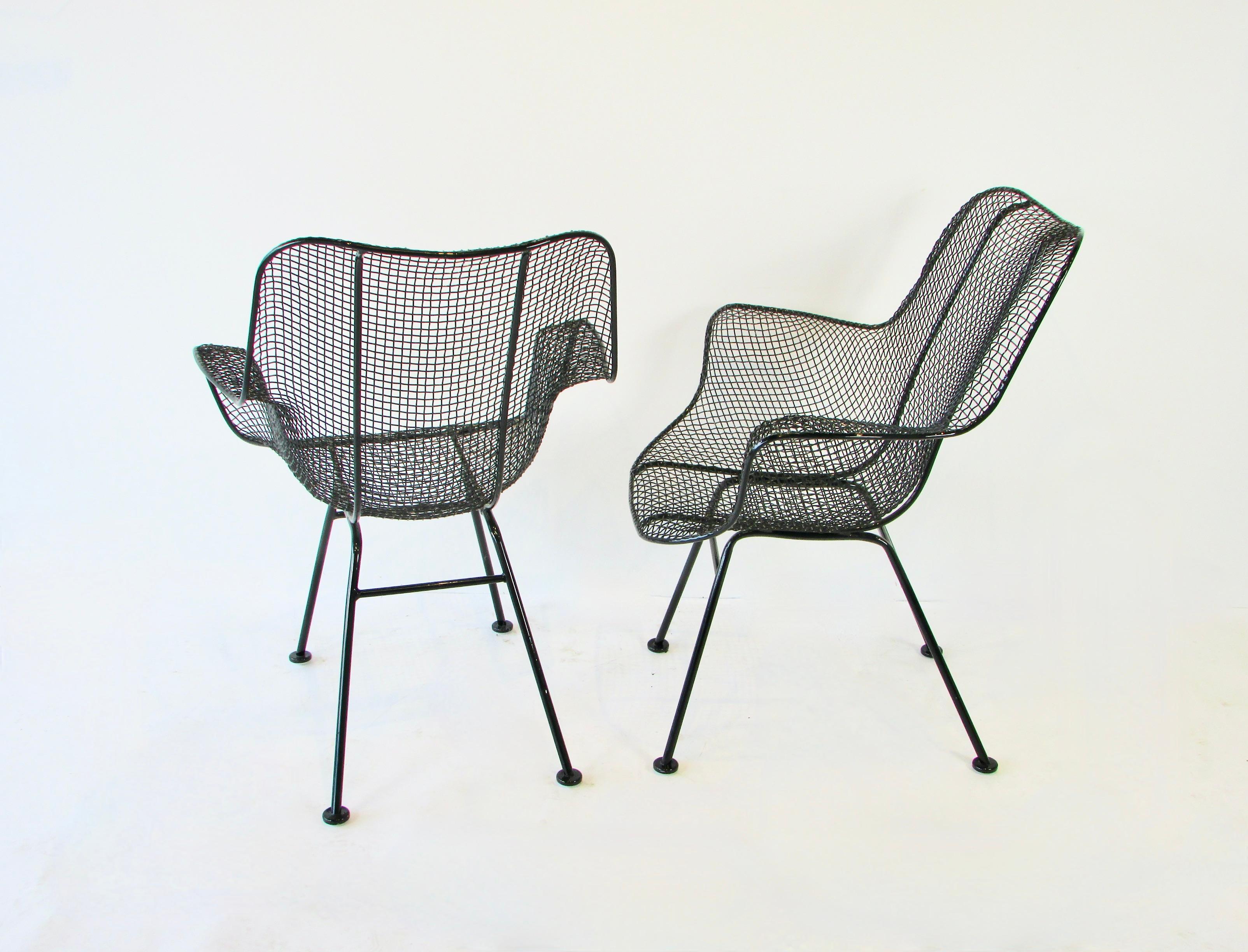 Powder-Coated Pair of black Woodard Wrought Iron with Steel Mesh Tall Back Lounge Chairs For Sale