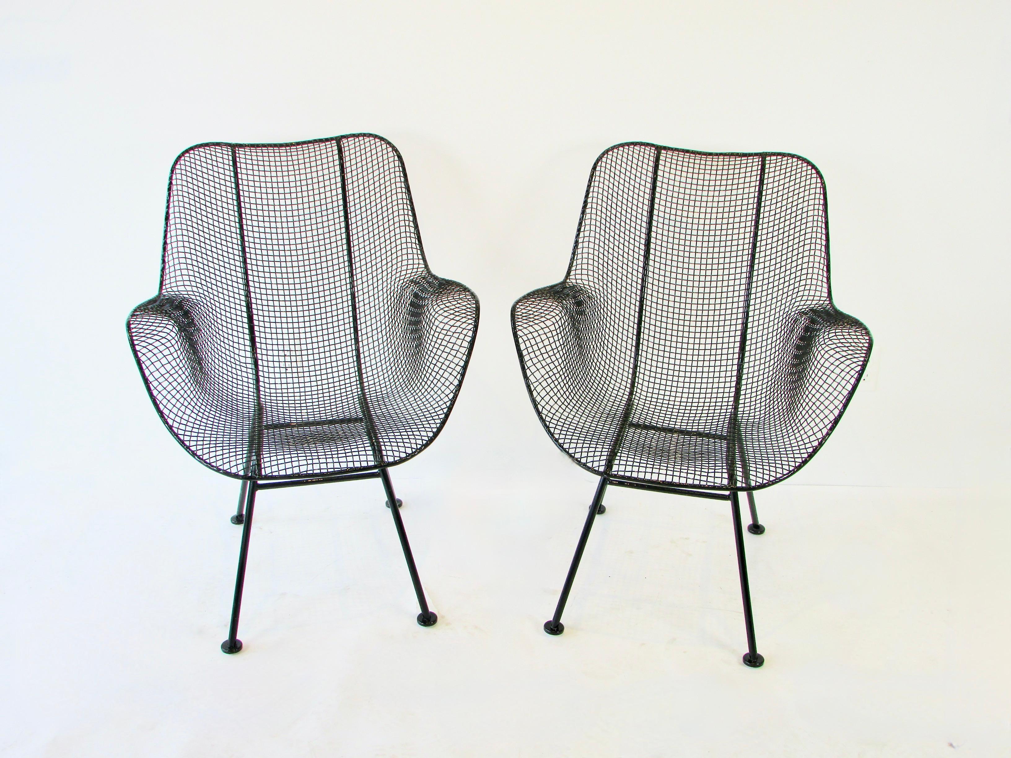 Pair of black Woodard Wrought Iron with Steel Mesh Tall Back Lounge Chairs In Good Condition For Sale In Ferndale, MI