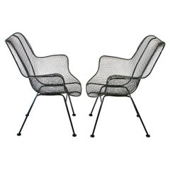 Retro Pair of black Woodard Wrought Iron with Steel Mesh Tall Back Lounge Chairs