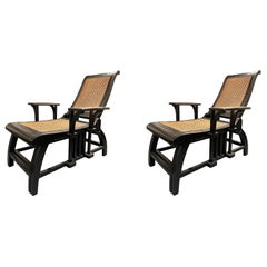 Pair of Black Woven Chaise Lounges