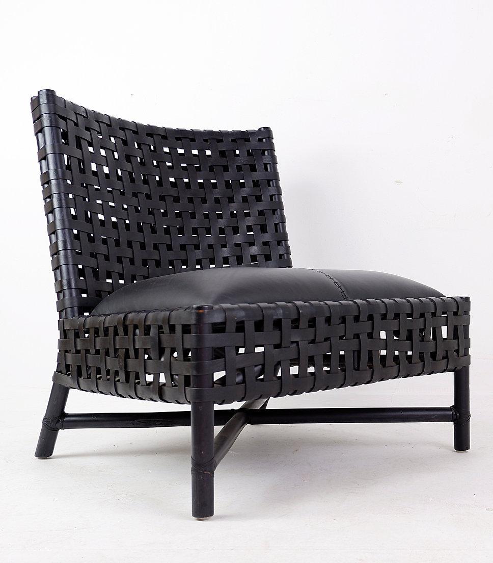 Pair of black woven leather lounge chairs For Sale 2