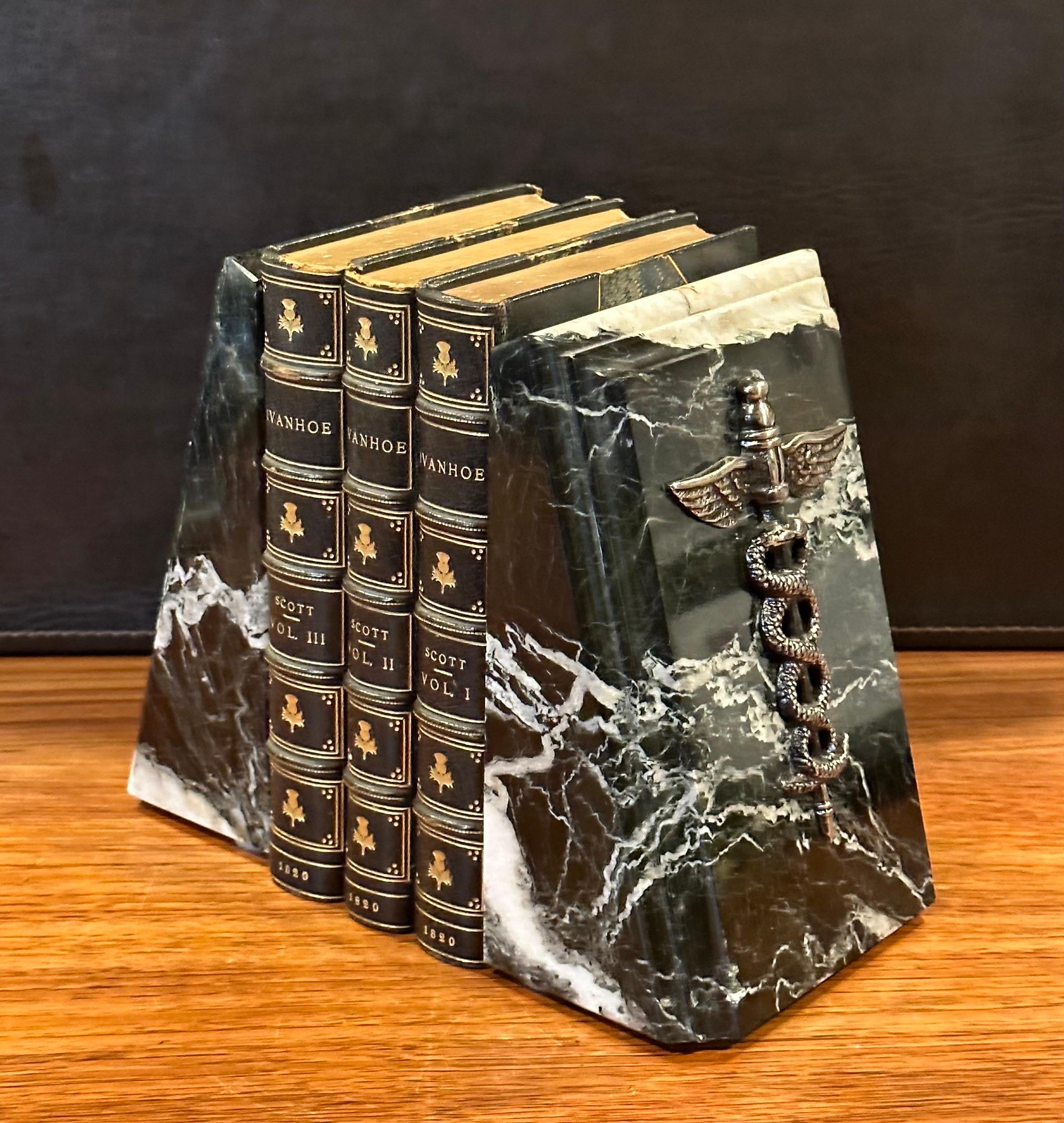 Pair of Black Zebra Marble Beveled Wedge Bookends with Caduceus Medical Emblem In Good Condition In San Diego, CA