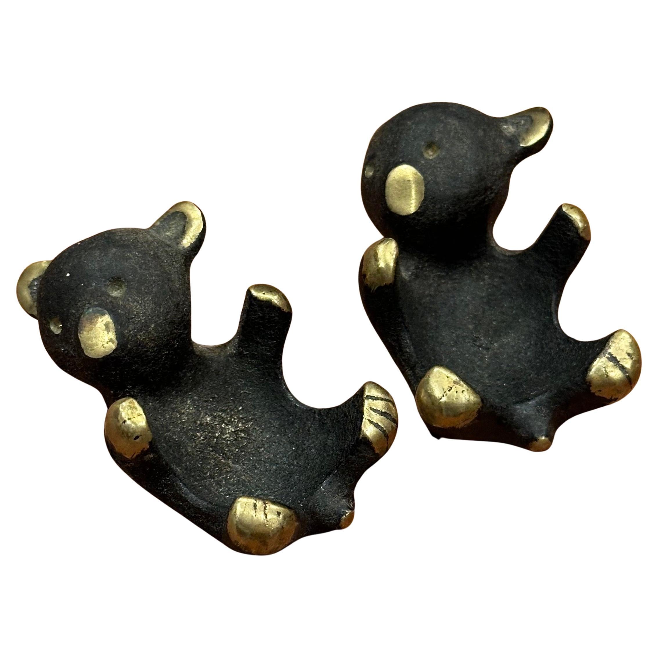 Fun pair of blackened bronze small bear trinket trays / candle holders by Walter Bosse , circa 1950's.  The pair are in very good vintage condition with a great patina and measure 2.75