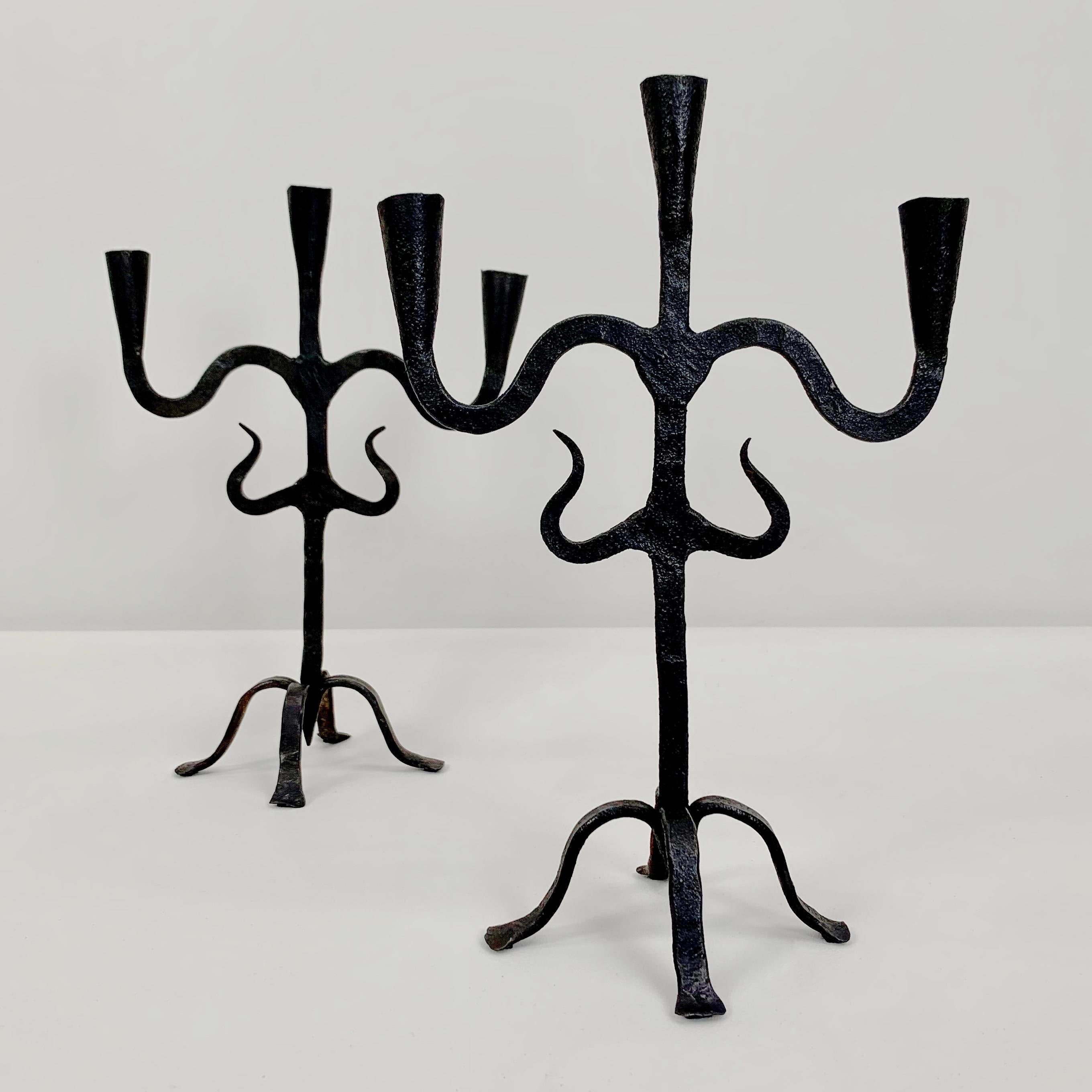 Mid-Century Modern Pair of Blackened Wrought Iron Candlesticks, France circa 1950.