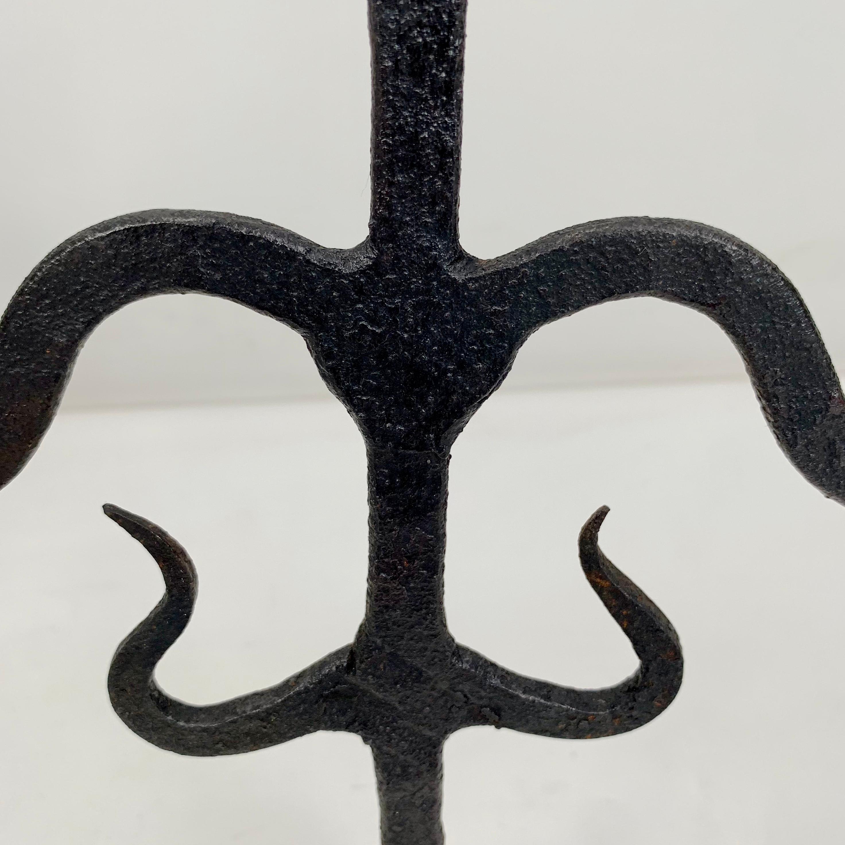 Mid-20th Century Pair of Blackened Wrought Iron Candlesticks, France circa 1950.