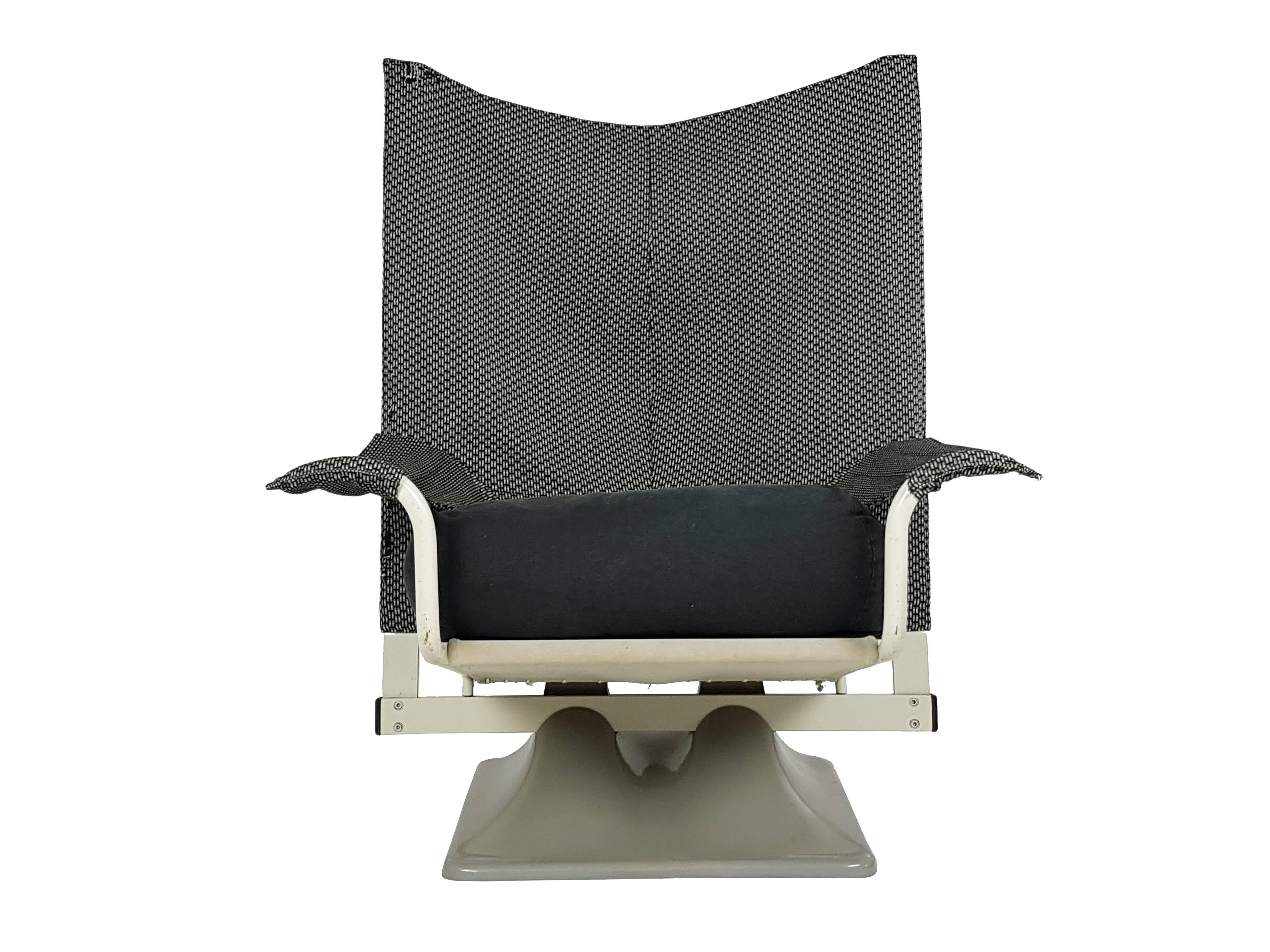 This pair of AEO armchairs was designed by Archizoom Associates for Cassina in 1975. They are made from a plastic and sculptural base with a light grey steel frame. Black and white upholstery is original but shows signs of age through small fabric