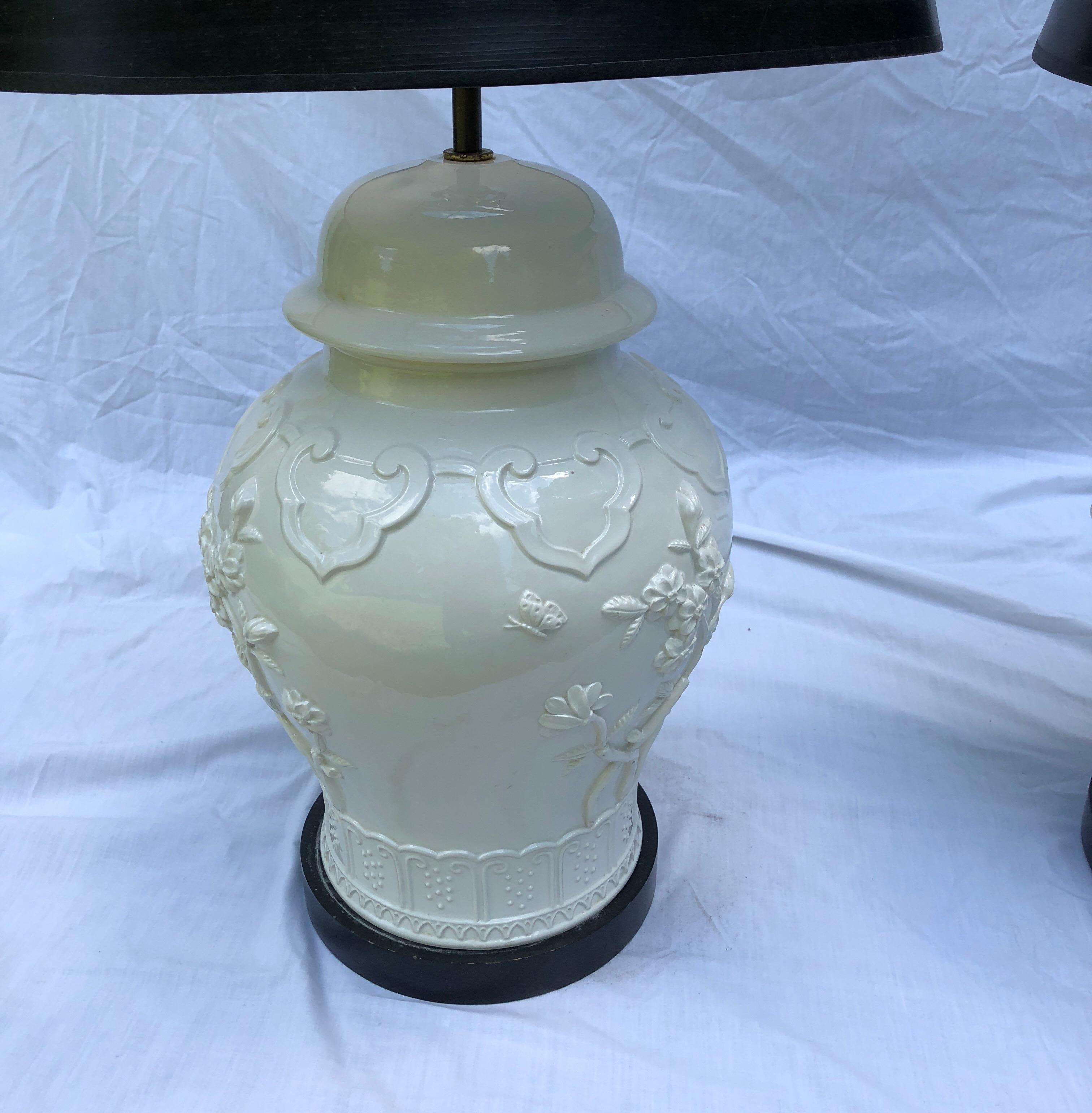 Pair of Blanc de Chine contemporary ginger jars mounted as lamps. Lamps probably made by
Frederick Cooper. Nice gutsy size, mint condition and new wiring. Shades not included.