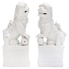 Antique Pair of Blanc de Chine Buddhist Lions, Foo Dogs Early Kangxi, 1662-1722