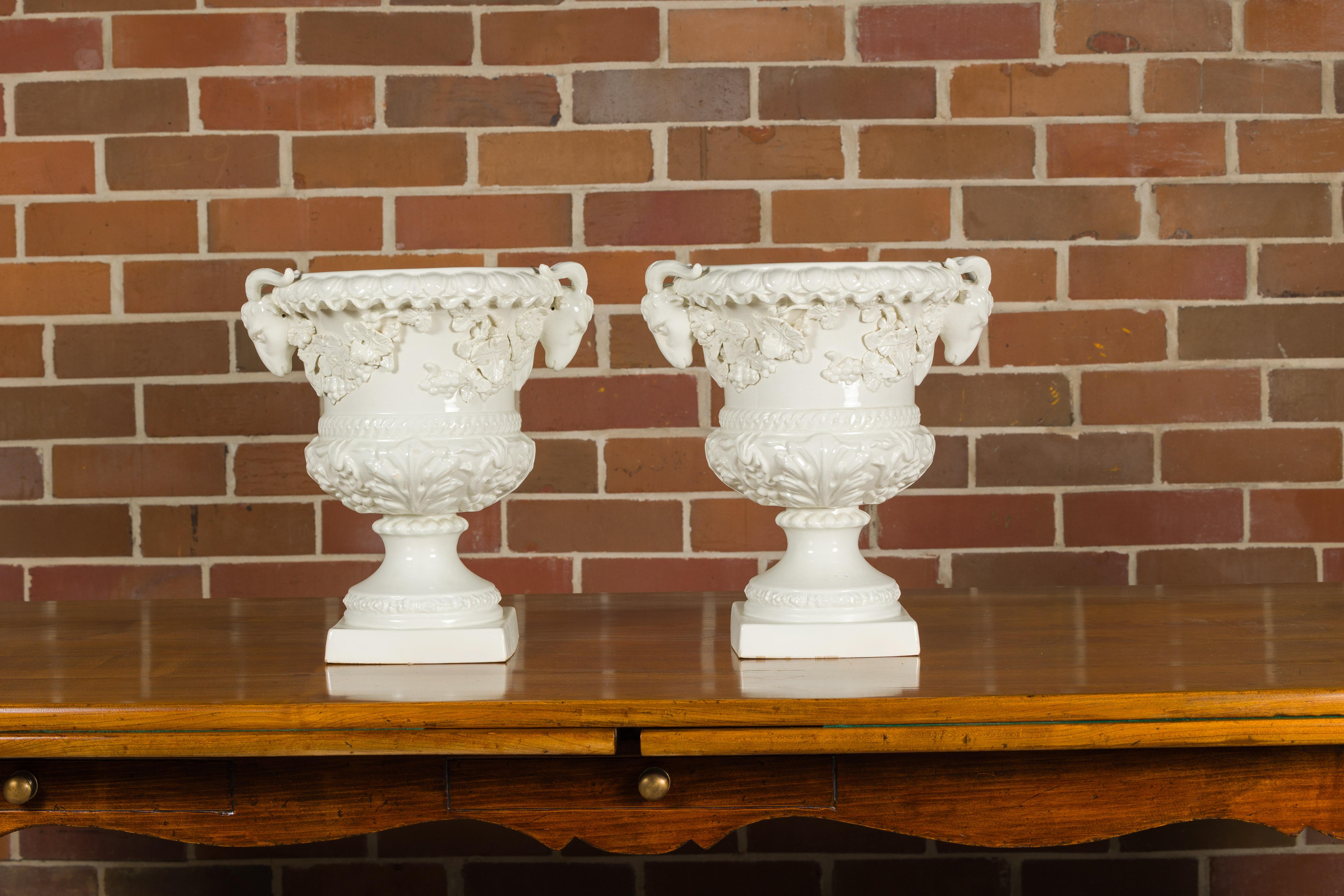 Pair of Blanc de Chine Midcentury Urns with Rams Heads and Ivy Leaves In Good Condition For Sale In Atlanta, GA