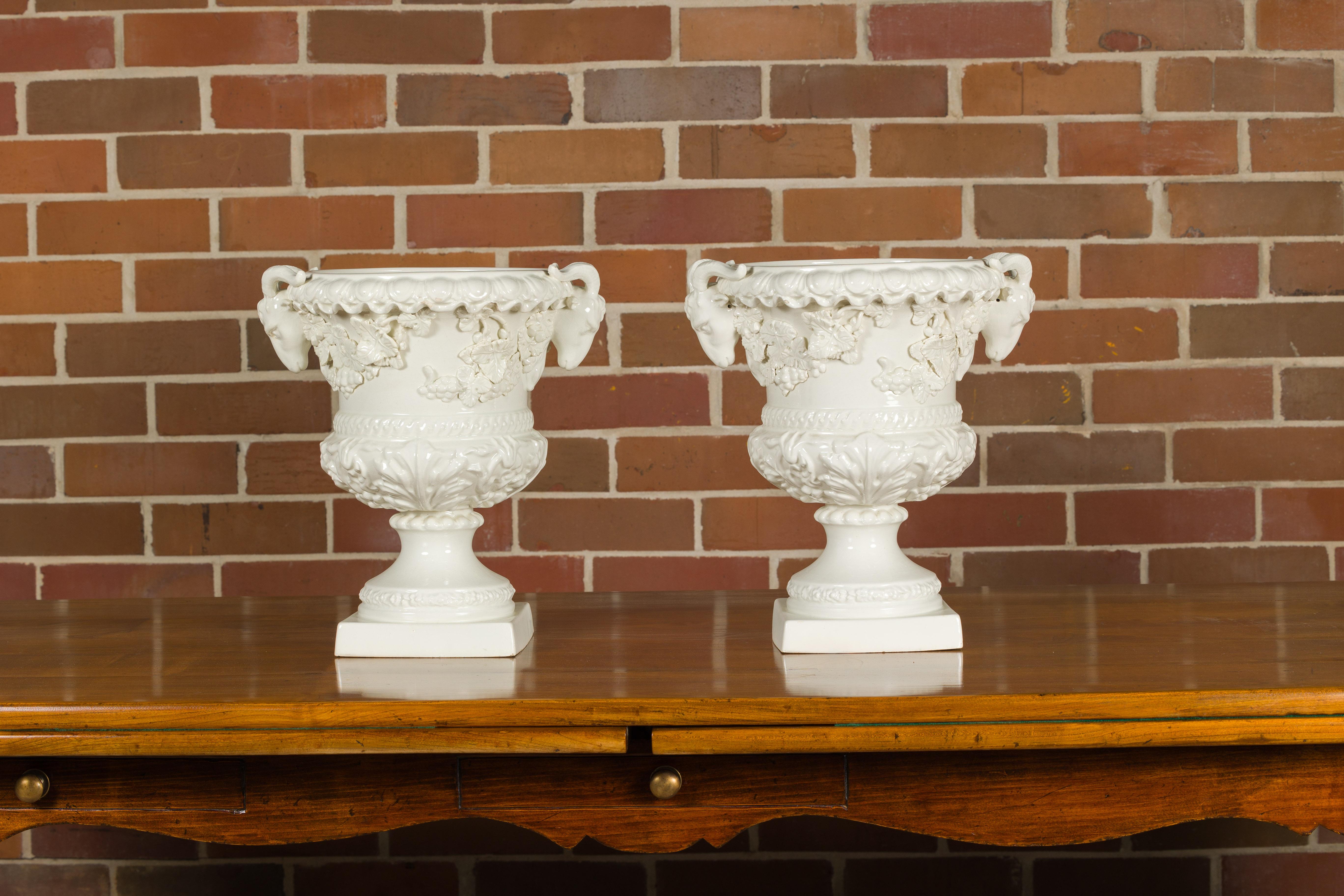 Pair of Blanc de Chine Midcentury Urns with Rams Heads and Ivy Leaves In Good Condition For Sale In Atlanta, GA