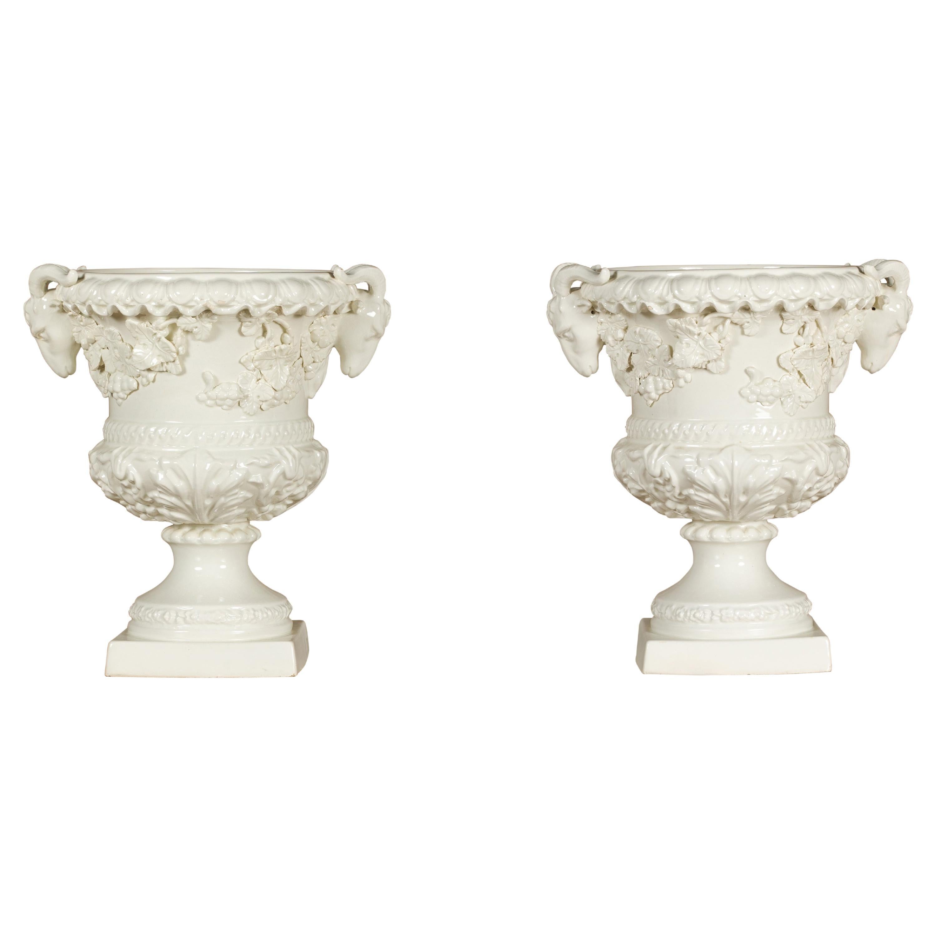 Pair of Blanc de Chine Midcentury Urns with Rams Heads and Ivy Leaves