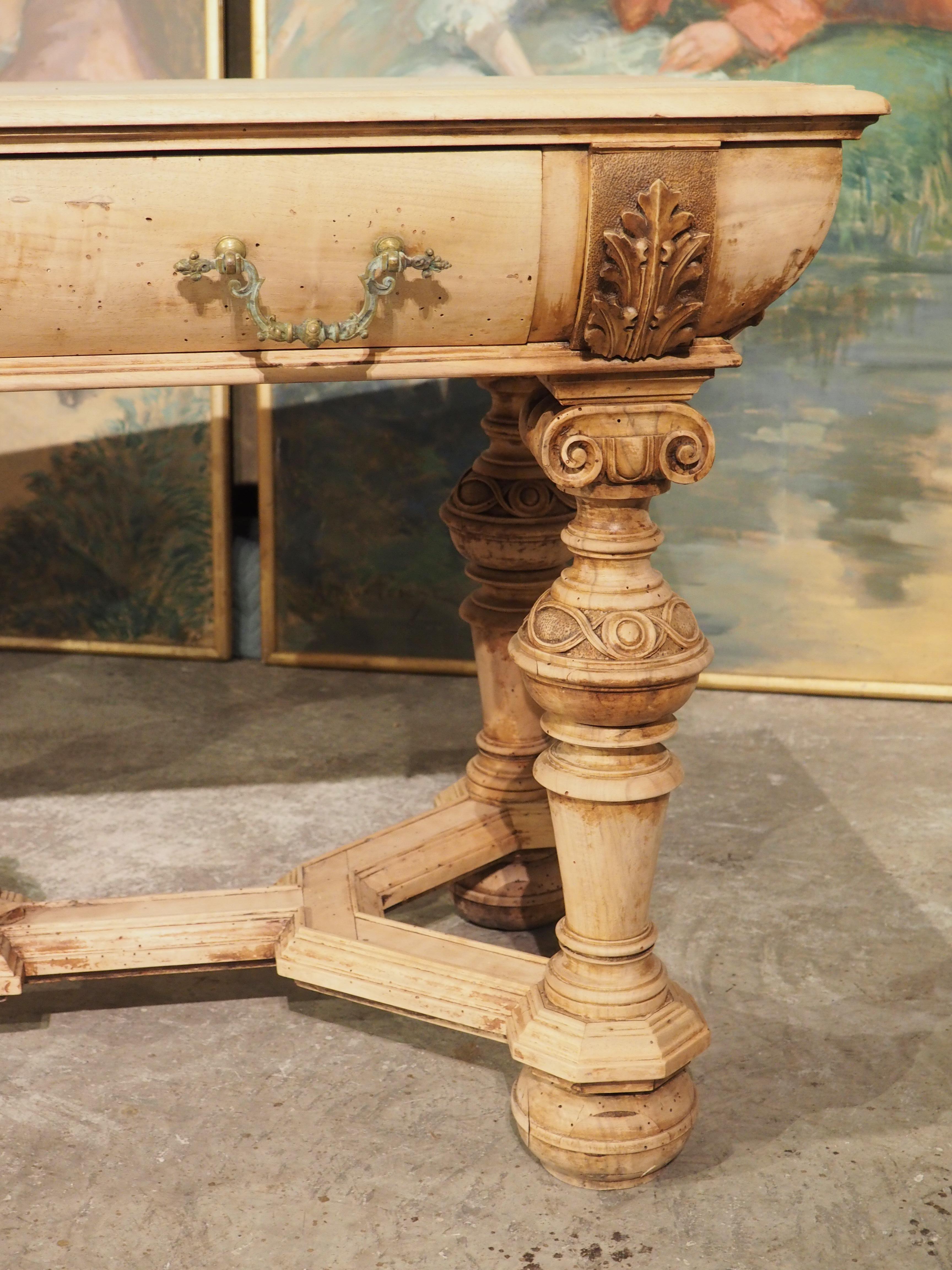 With slightly bulbous bodies, paired with decorative baluster legs and ball feet joined by angular stretchers, this pair of bleached Renaissance style tables from the 1800’s are definitively Dutch. The tables have been bleached at some point,