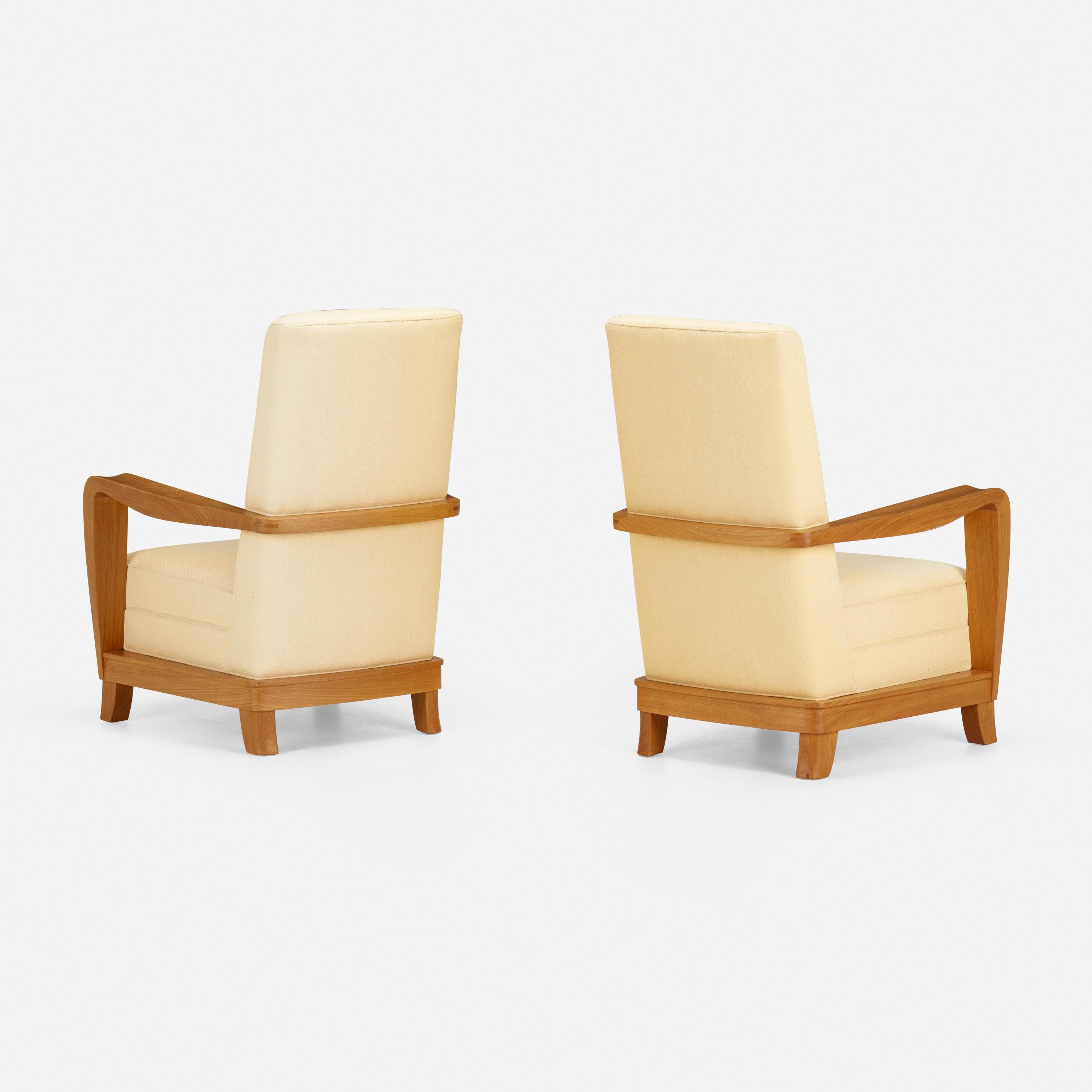 Pair of bleached mahogany upholstered armchairs after a model by Maxime old.
brand new upholstered.