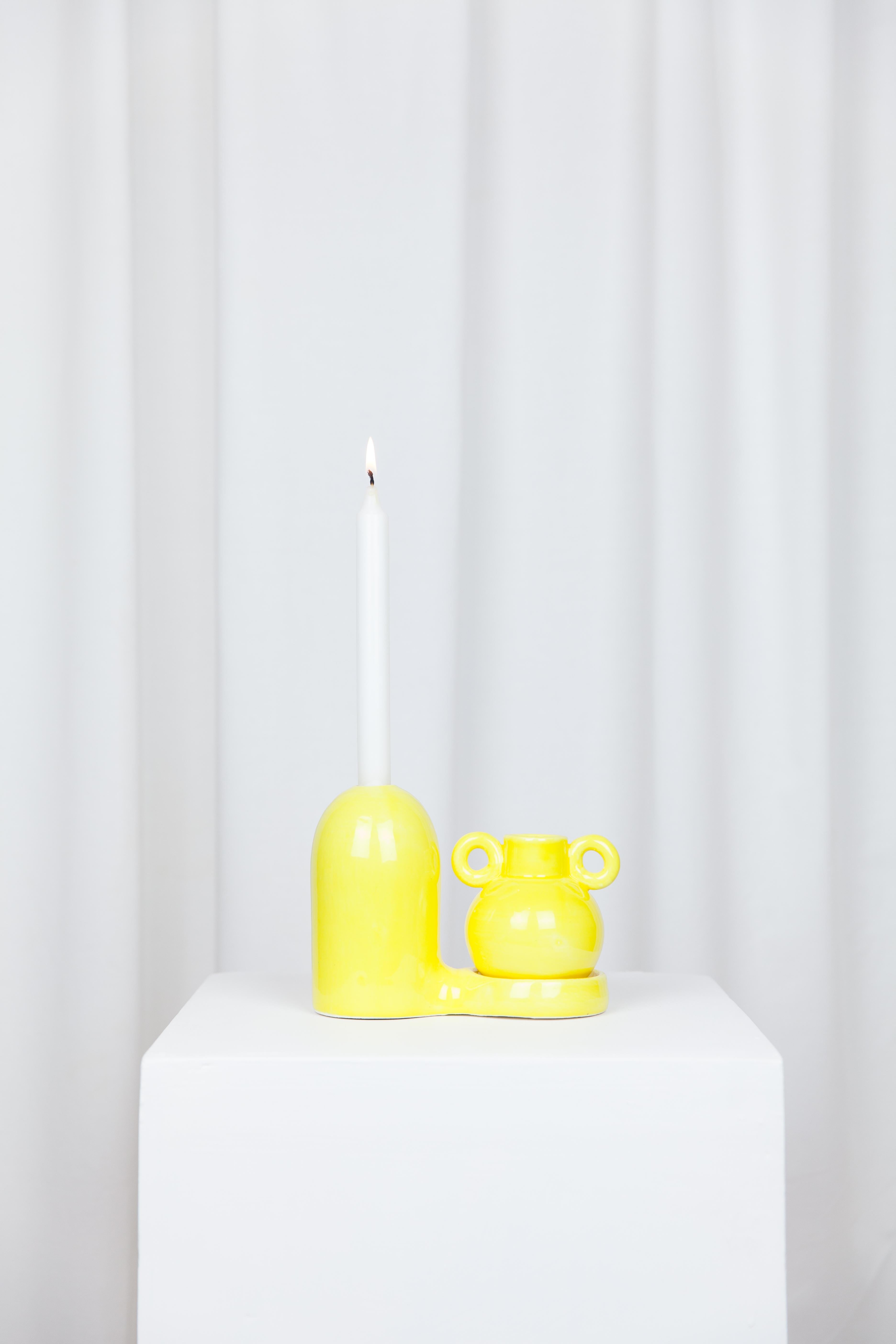 Pair of blend yellow candlestick by Lola Mayeras
Dimensions: D 16.5 x W 10 x W 13 cm
Materials: Earthenware.

Candlestick with detachable small vase, red earthenware with a wax finish. Small vase glazed in beige on the inside.
This piece is