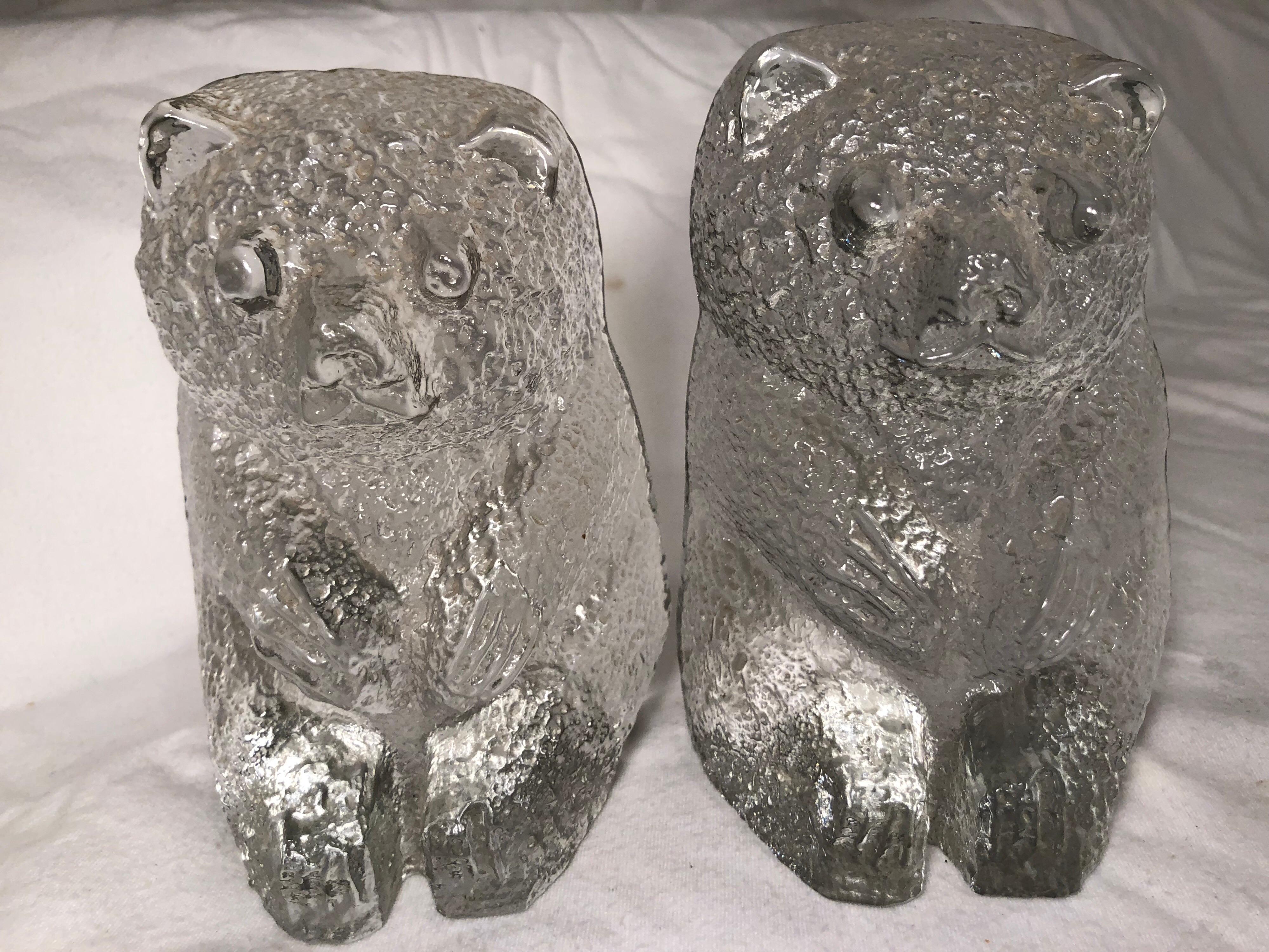 Pair of Blenko Glass Bear Bookends. Heavy molded clear glass in the shape of a bear. Fun for any kids room or Hunters office. These whimsical bookends can also be used flat as paperweights.