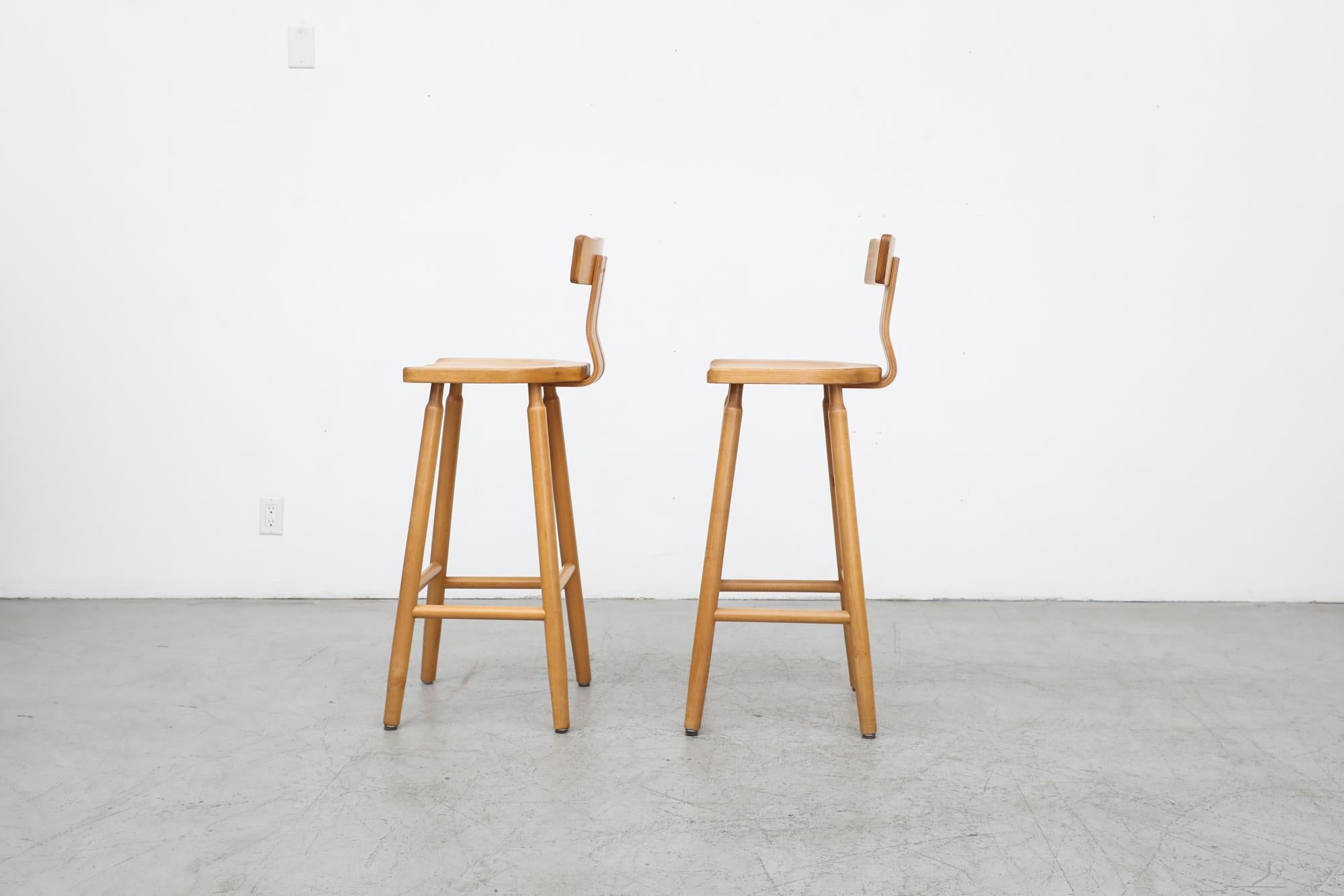 pair of bar stools with backs