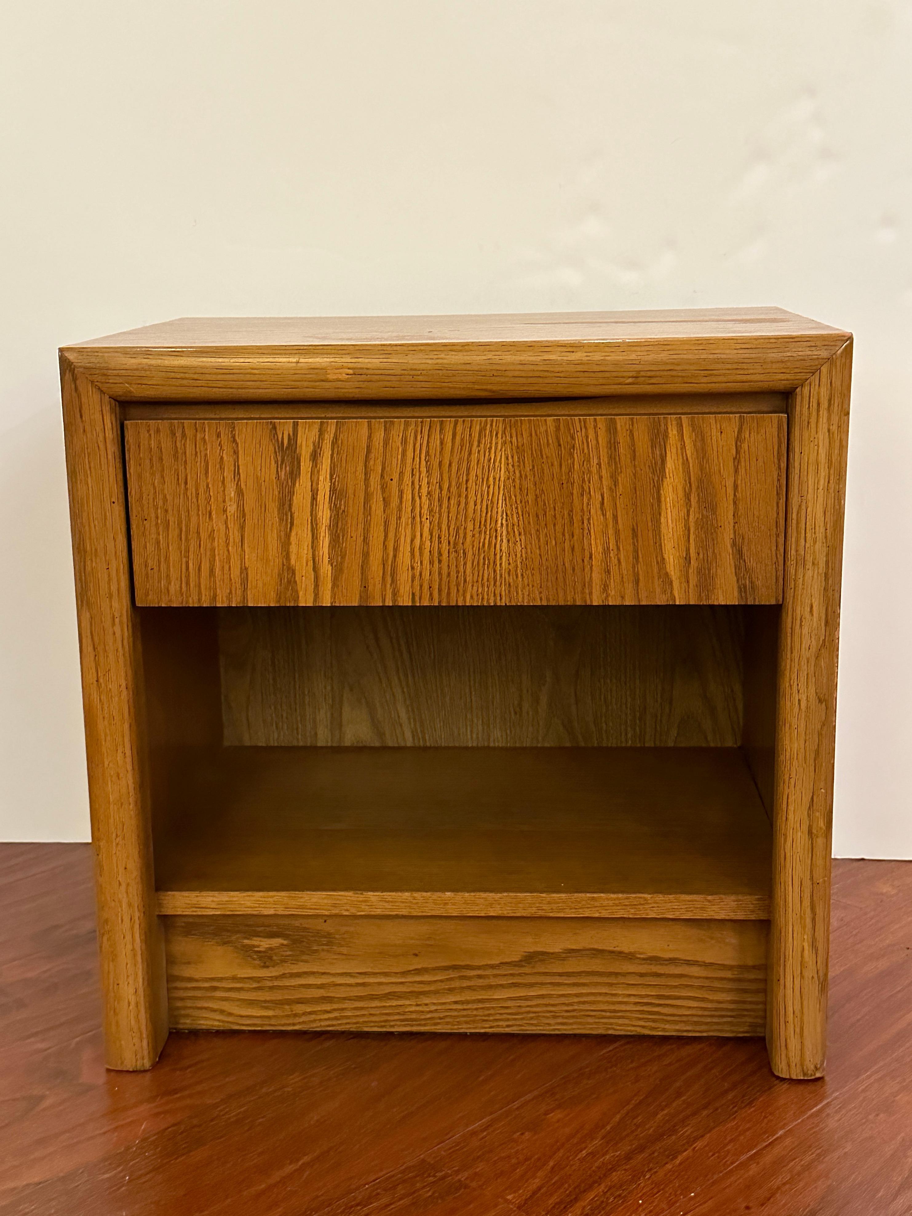 This pair of mid-century nightstands features one drawer and a space to store books or magazines. They show the manufacturer's stamp and, what is very rare the past owner kept the manufacture booklet explaining how to take care of them!
They are