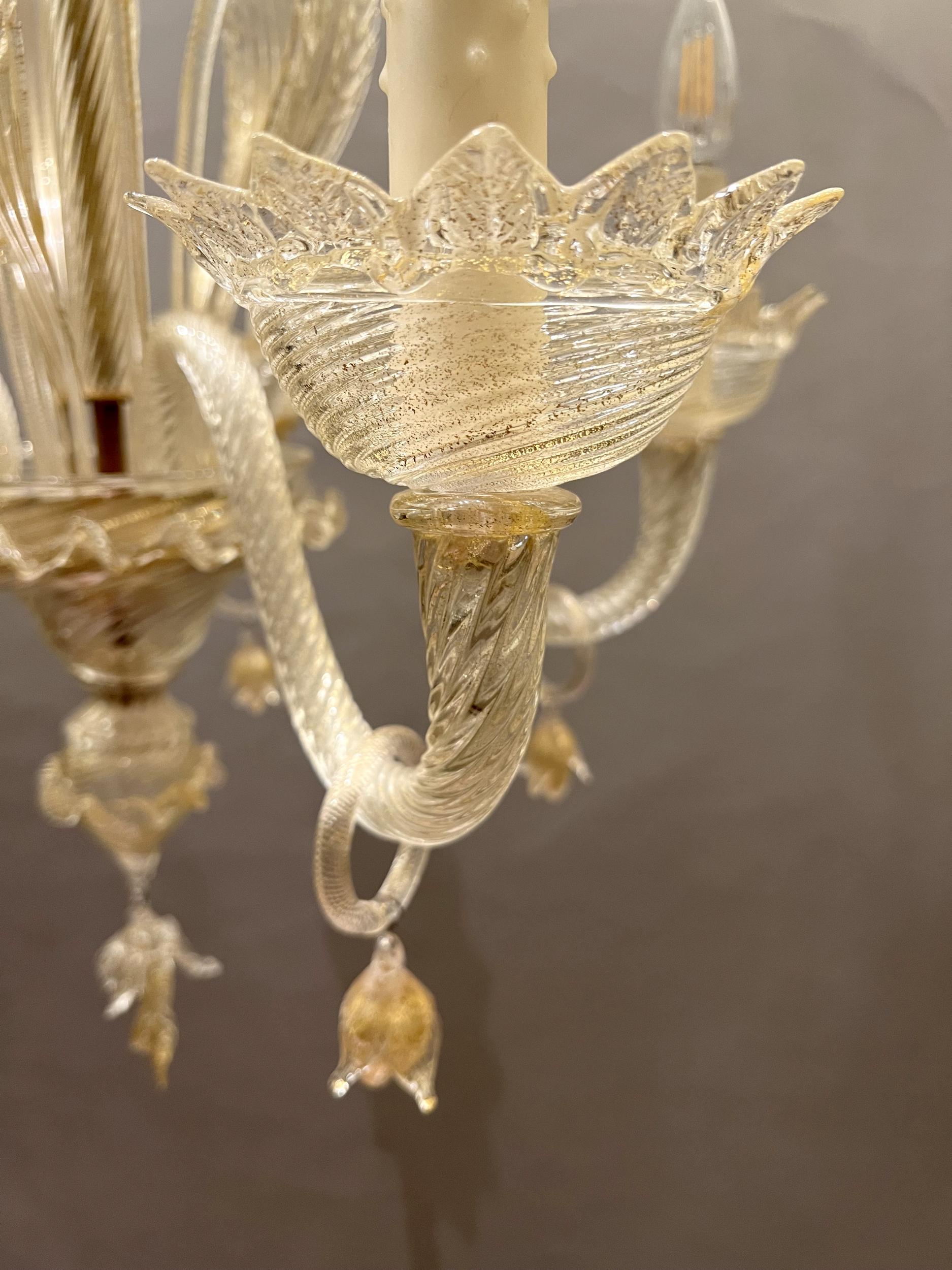 Gold Pair of blown glass chandeliers, Murano, Italy, circa 1970 For Sale
