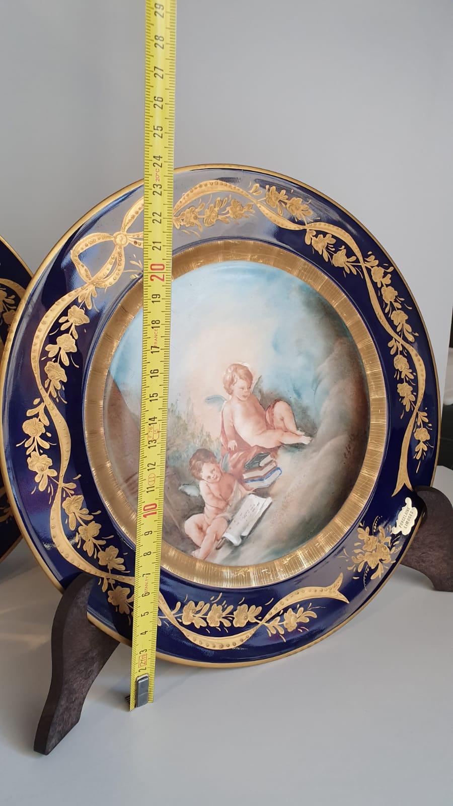 Pair of Blue and Gold Limoges Porcelain Plates Finely Hand Painted Cherubs For Sale 4