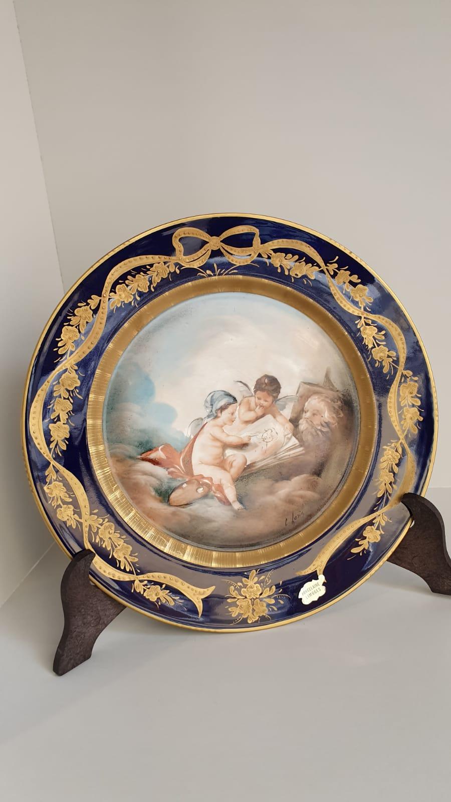 French Pair of Blue and Gold Limoges Porcelain Plates Finely Hand Painted Cherubs For Sale