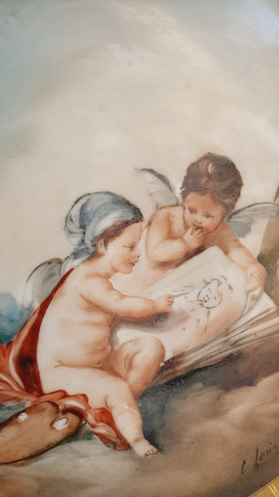 Hand-Crafted Pair of Blue and Gold Limoges Porcelain Plates Finely Hand Painted Cherubs For Sale